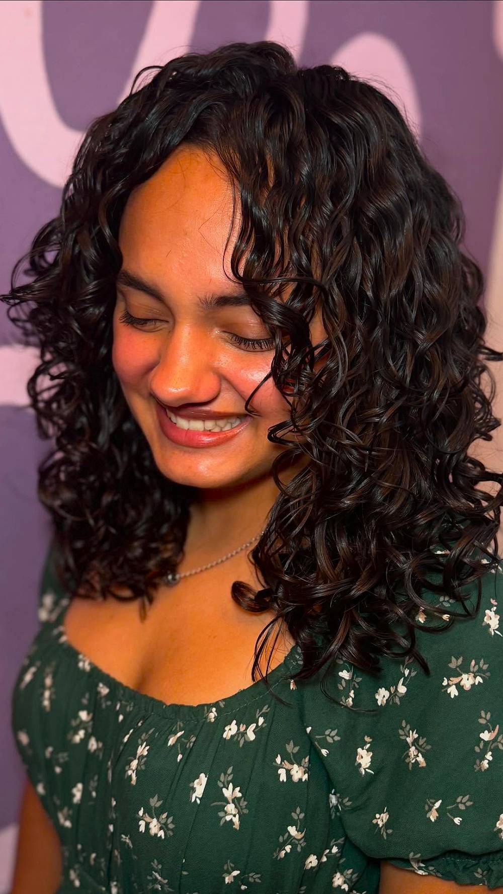 Playful Curly Shoulder-Length Cut