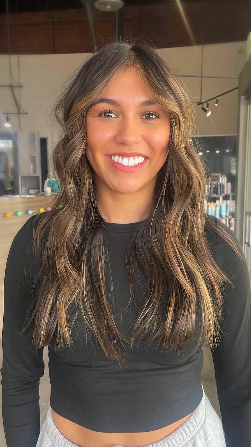 Radiant Warm Brunette Waves with Face-Framing Highlights