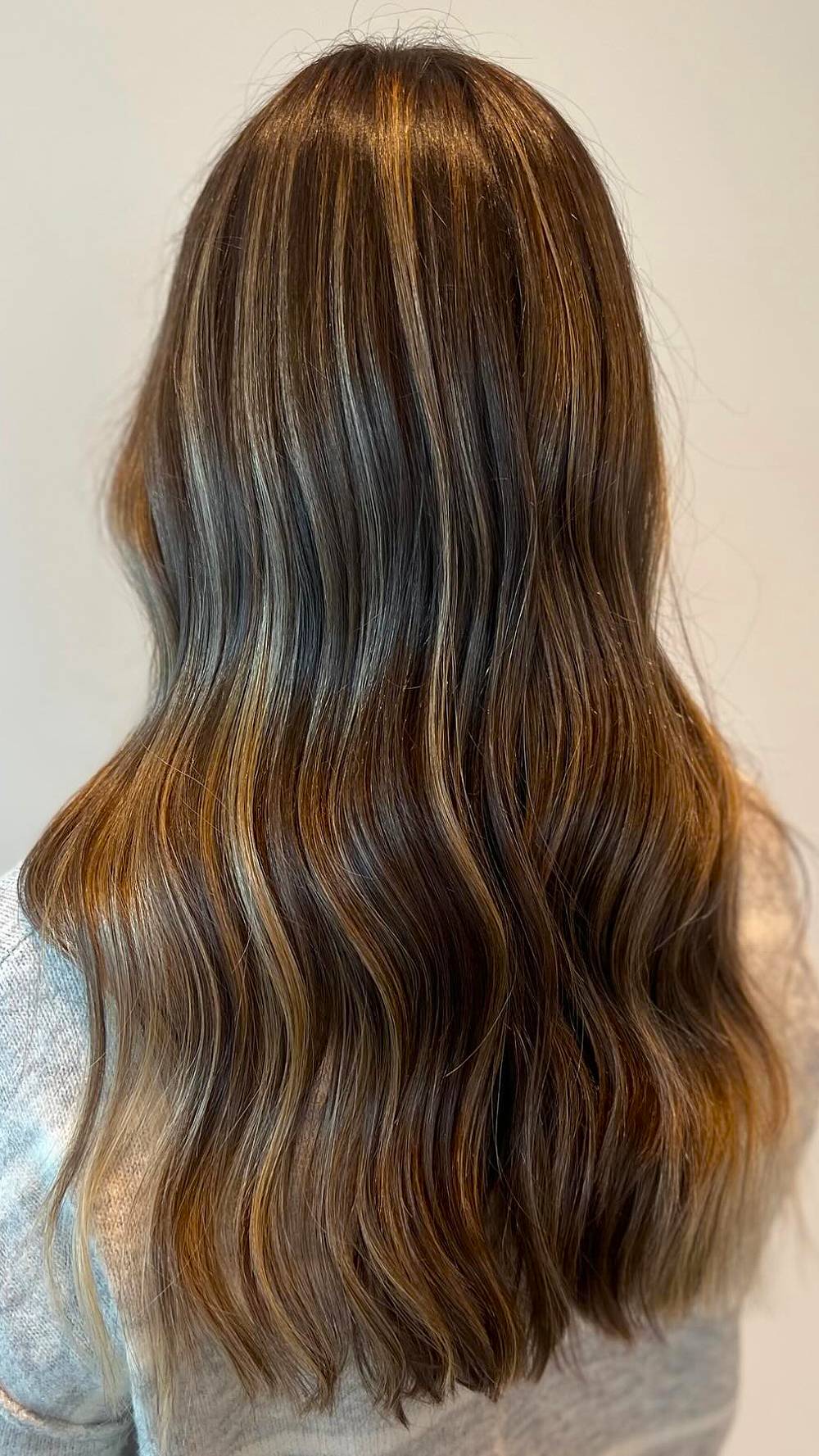 Softly Textured Brunette Waves with Golden Highlights
