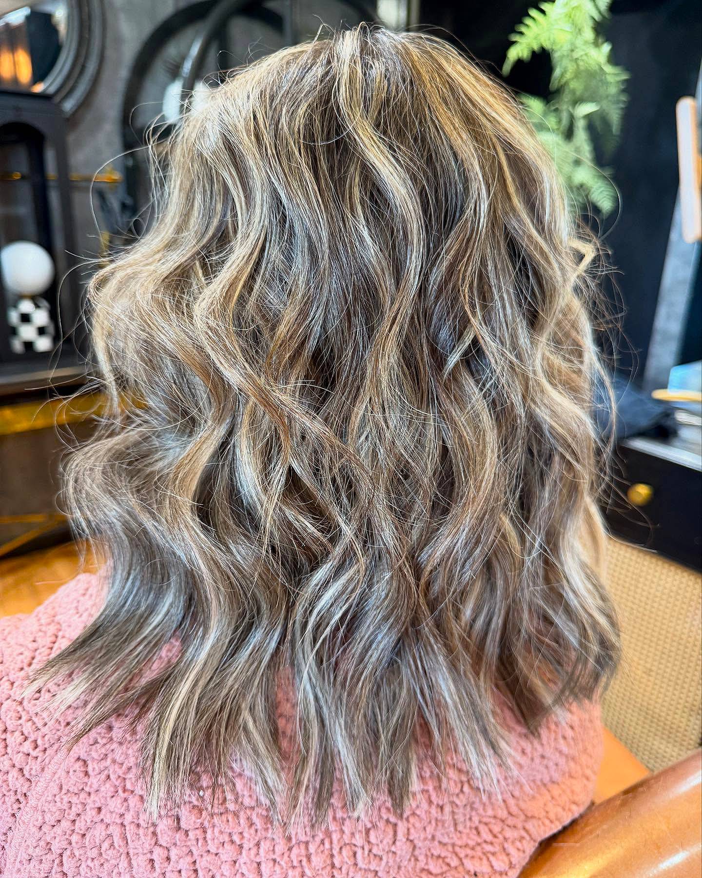 Textured Wavy Medium Length Cut with Subtle Highlights