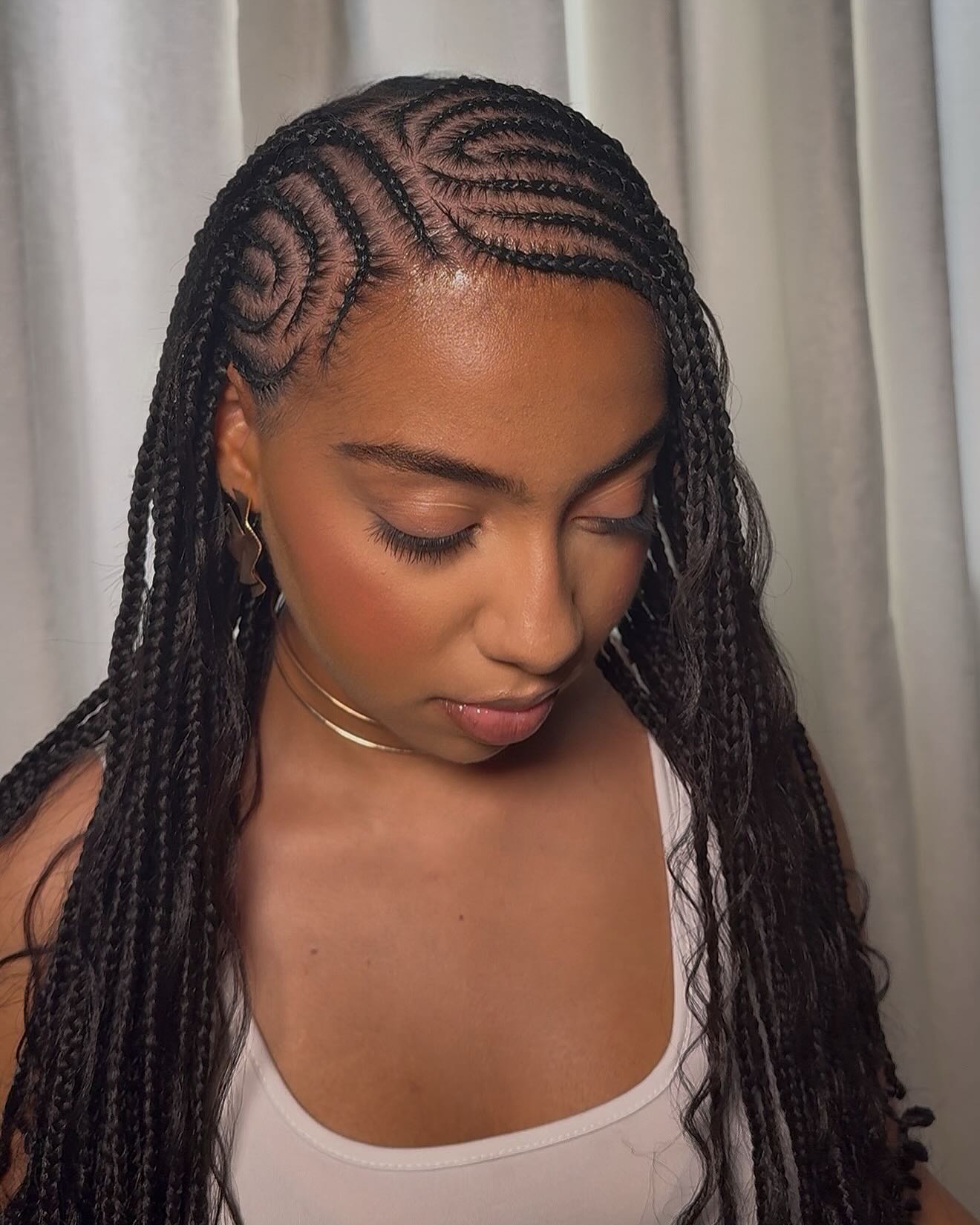 Artfully Designed Fulani Braids with Intricate Parting