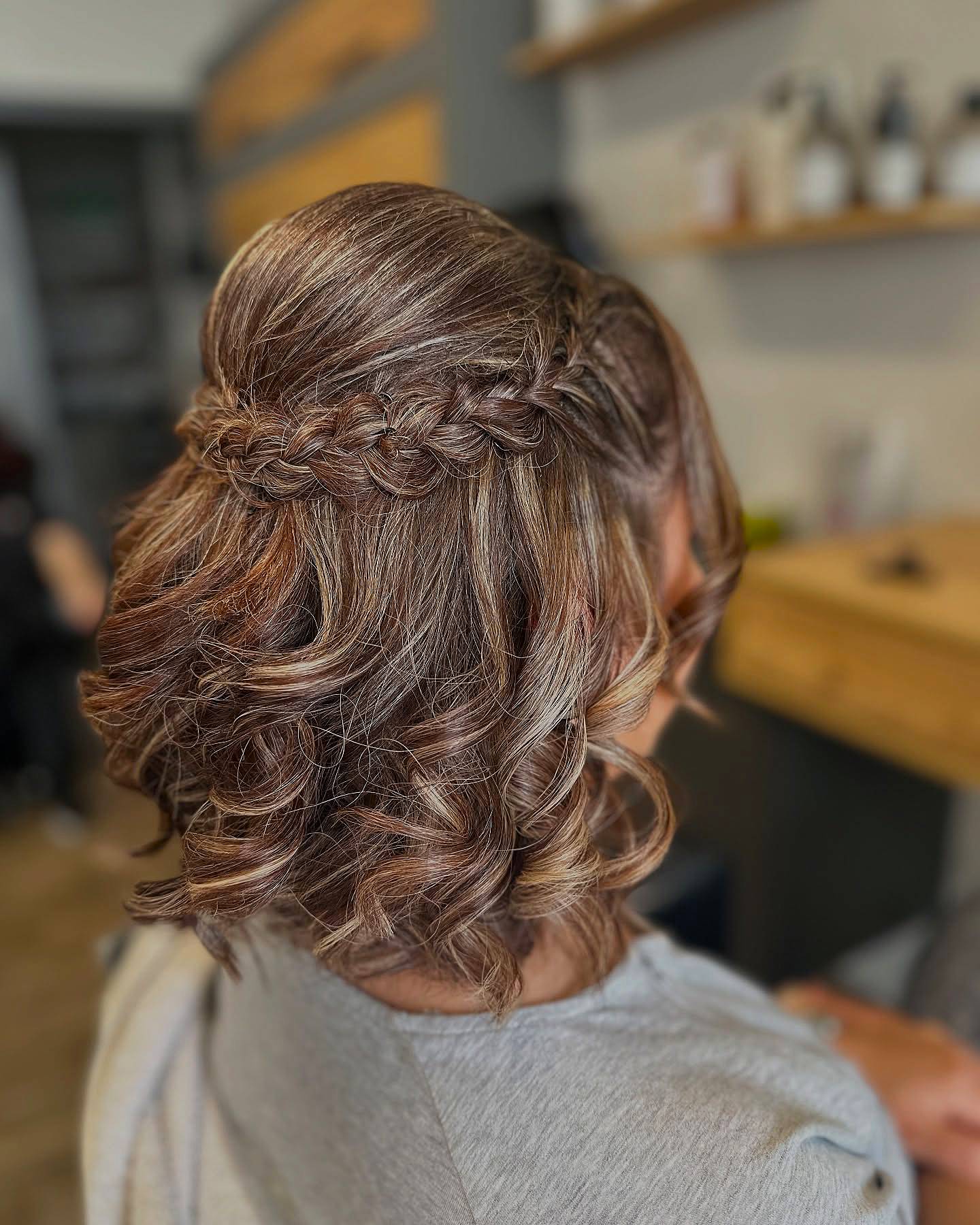 Chic Curly Half-Up with Braided Accent