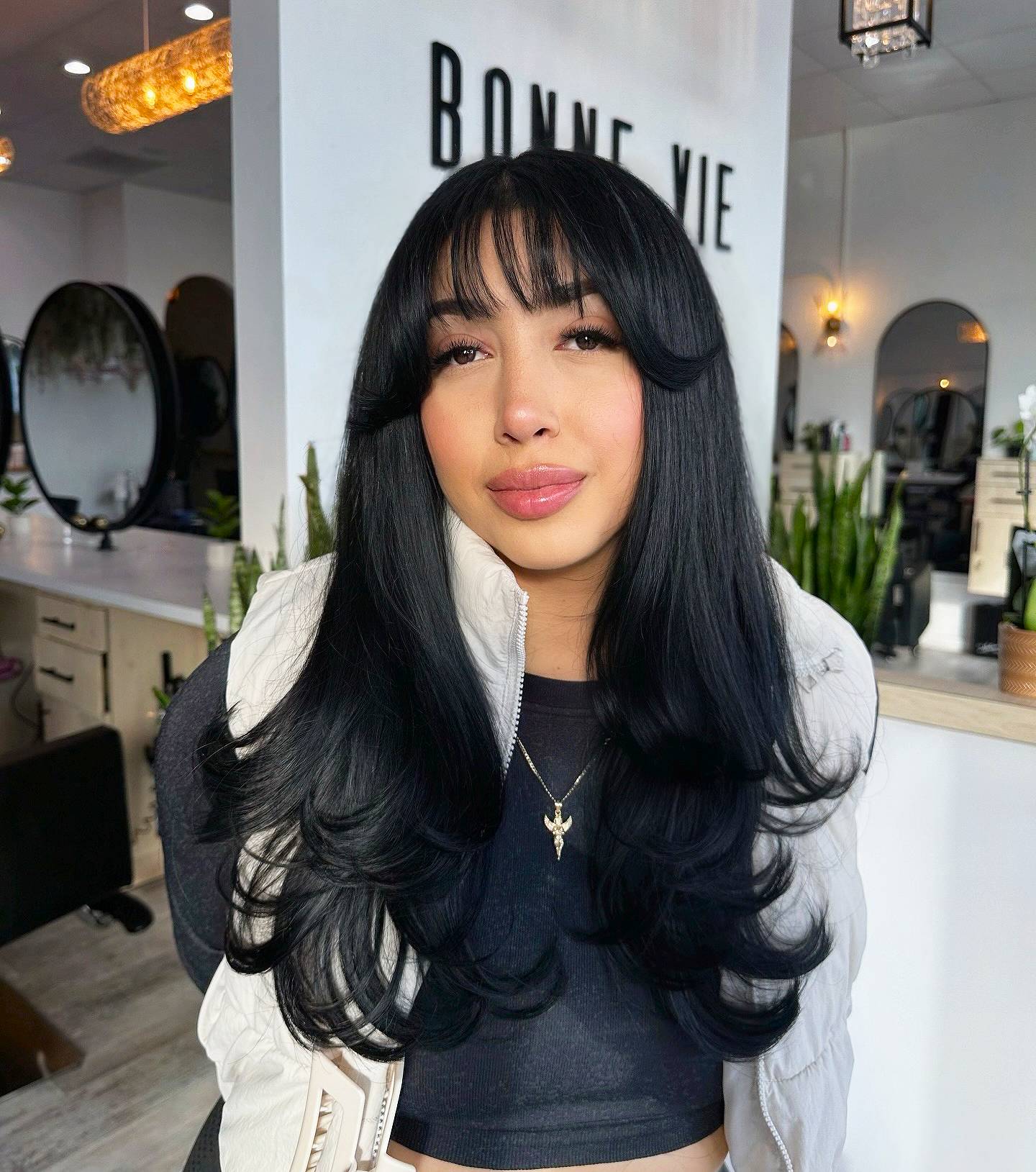 Chic Long Layers with Wispy Bangs