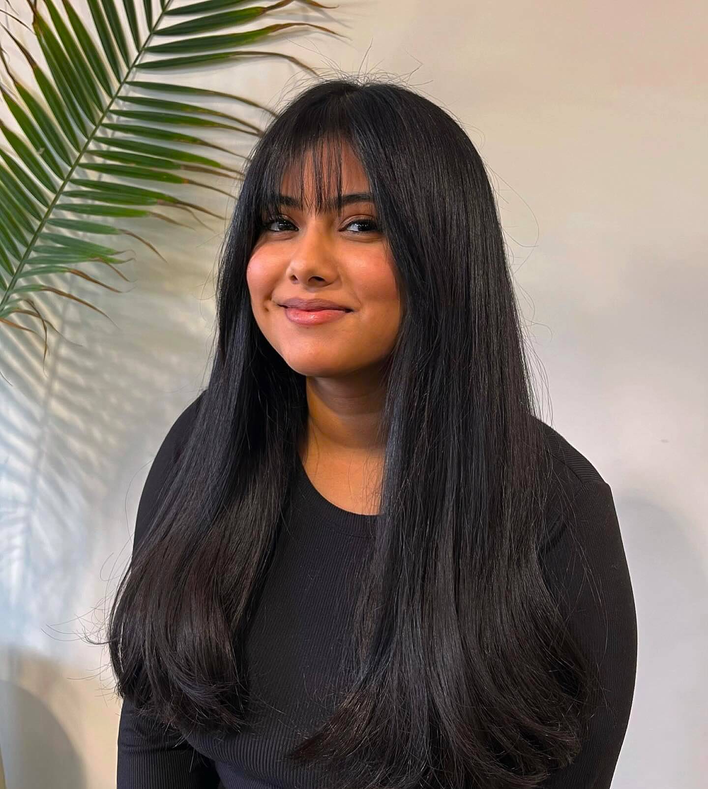 Chic Long Sleek Hair with Wispy Bangs