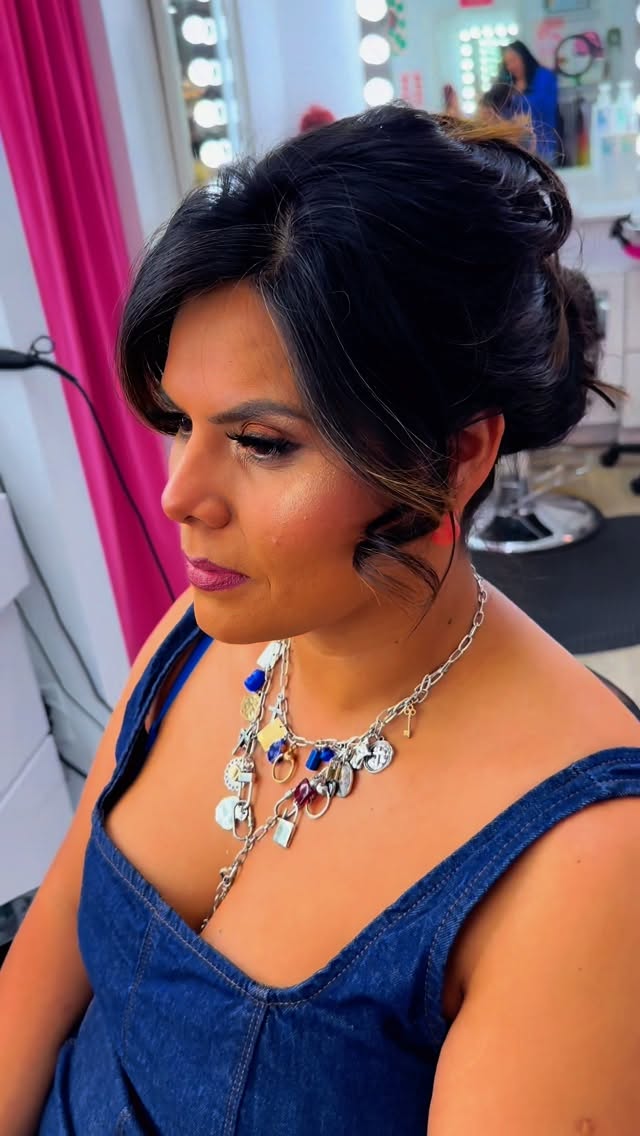 Chic Stacked Brunette Updo with Soft Highlights