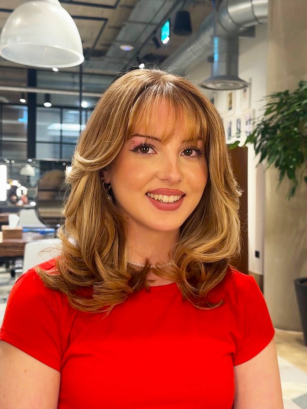 Chic Wispy Bangs with Layered Waves