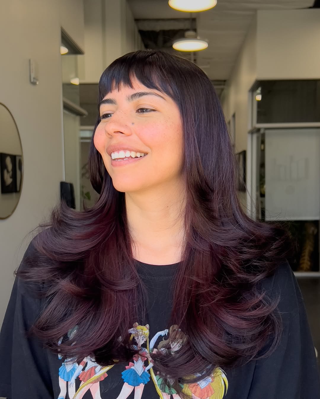 Deep Aubergine Glow with Glossy Cascading Curls