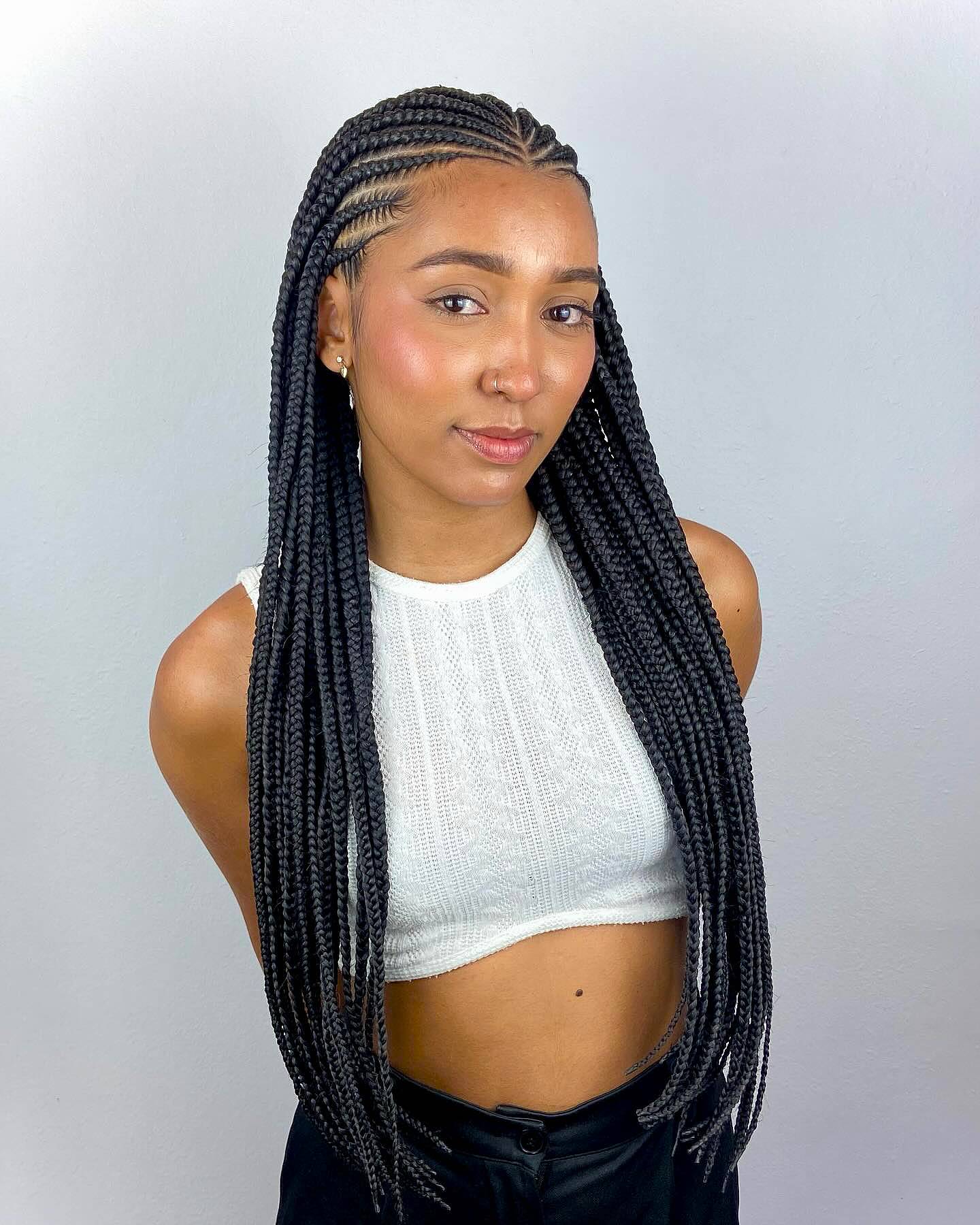Elegant Long Fulani Braids with Intricate Parting