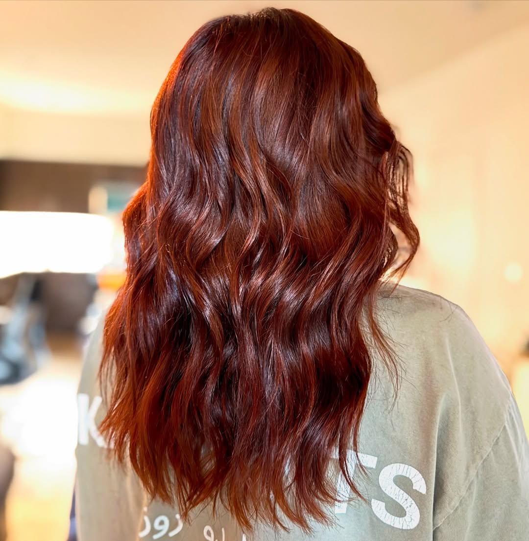 Glossy Auburn Tresses with Natural Waves