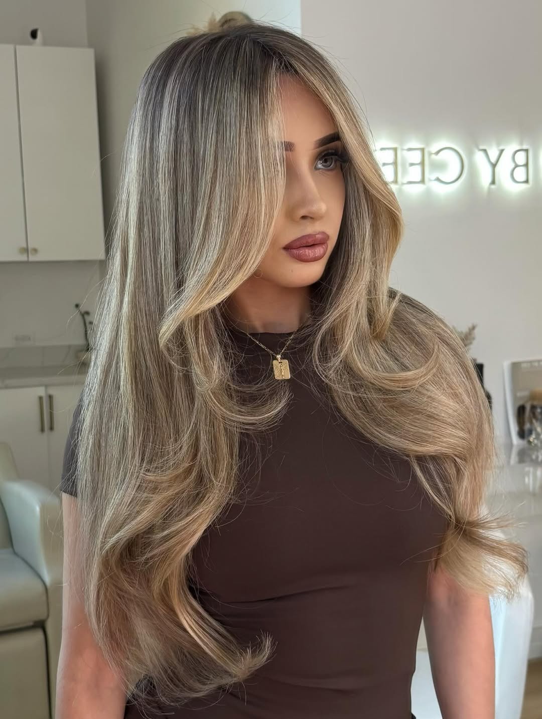 Glossy Caramel Balayage with Layered Waves