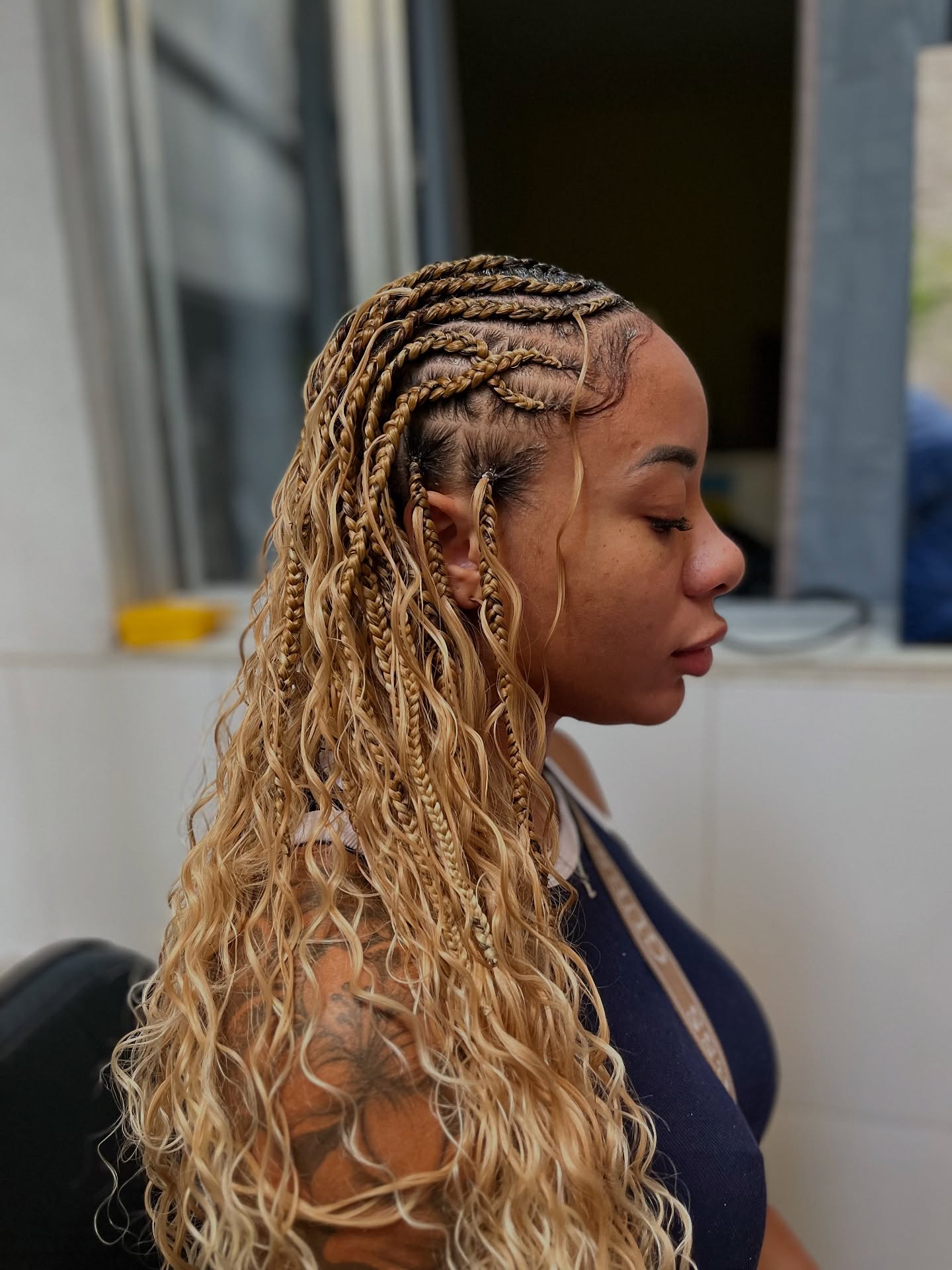 Intricate Fulani Braids with Loose Waves