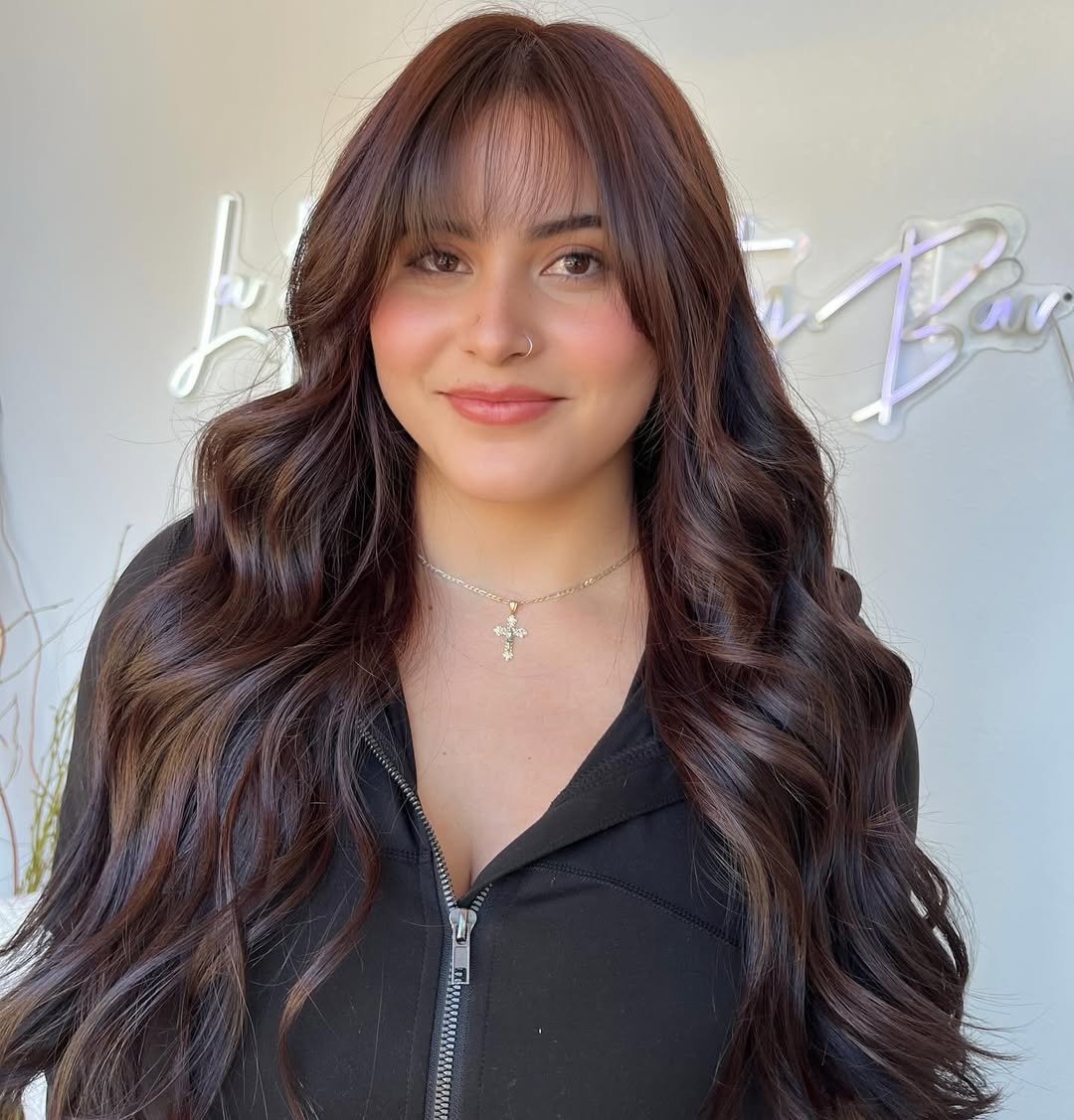 Luxurious Chestnut Waves with Wispy Bangs