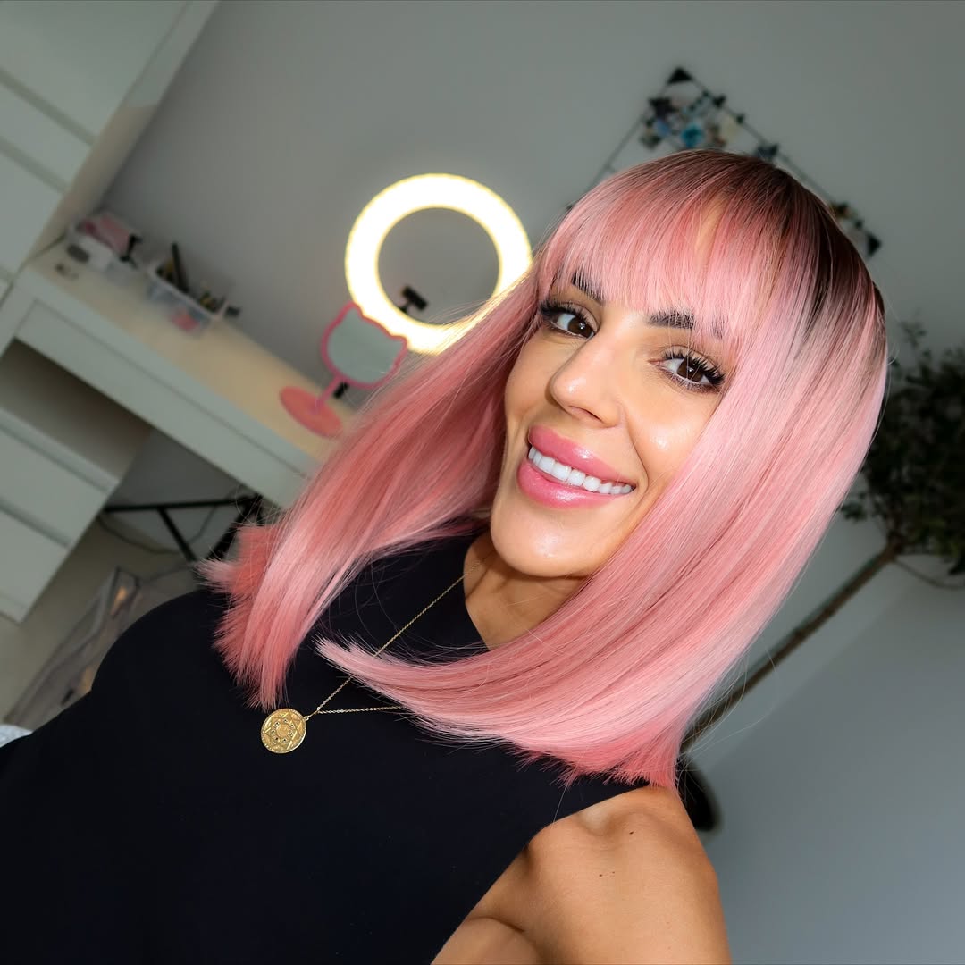 Playful Pink Bob with Feathered Bangs