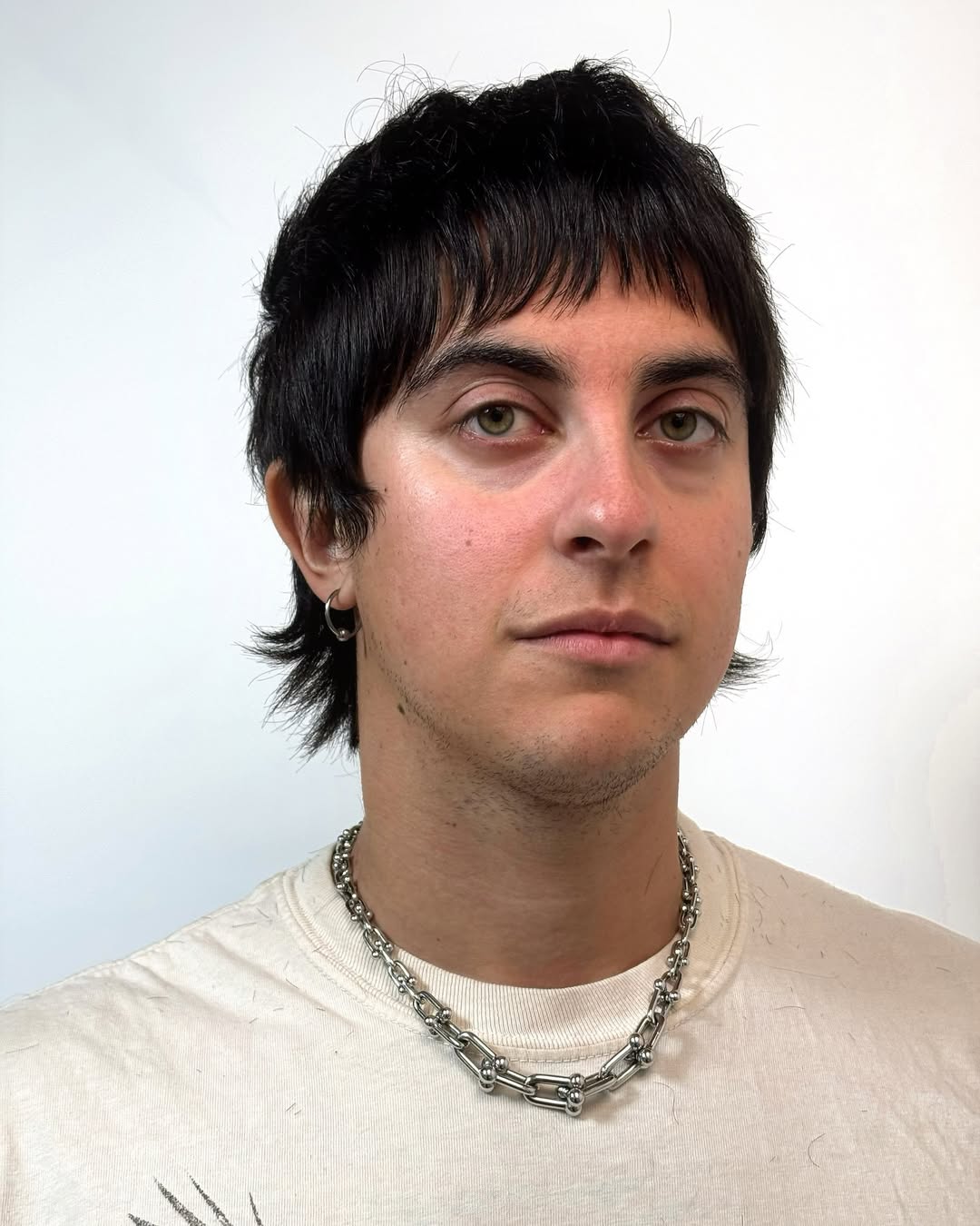 Sleek Black Razor-Cut with Angular Fringe