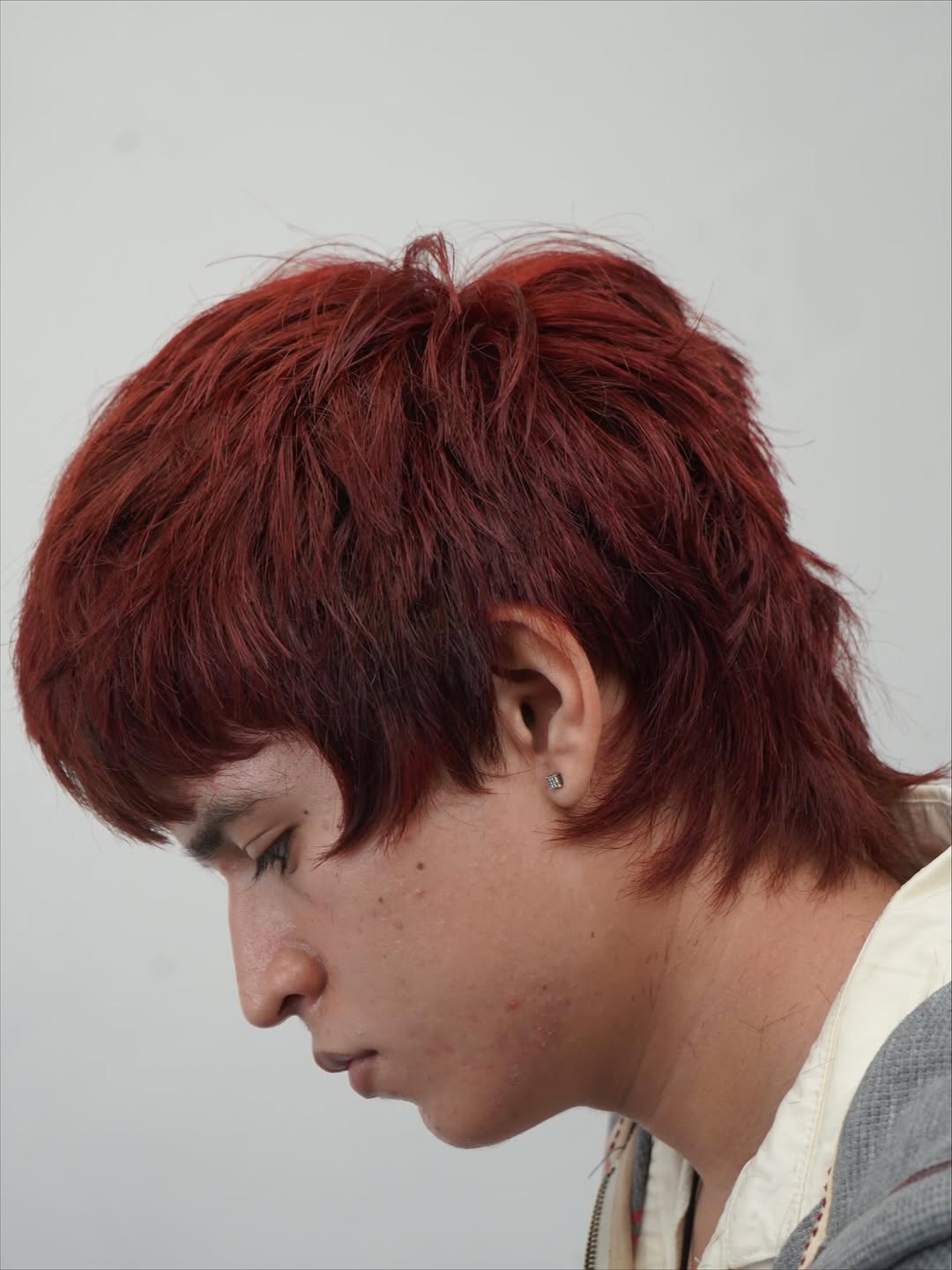 Vibrant Crimson Textured Crop with Asymmetrical Bangs
