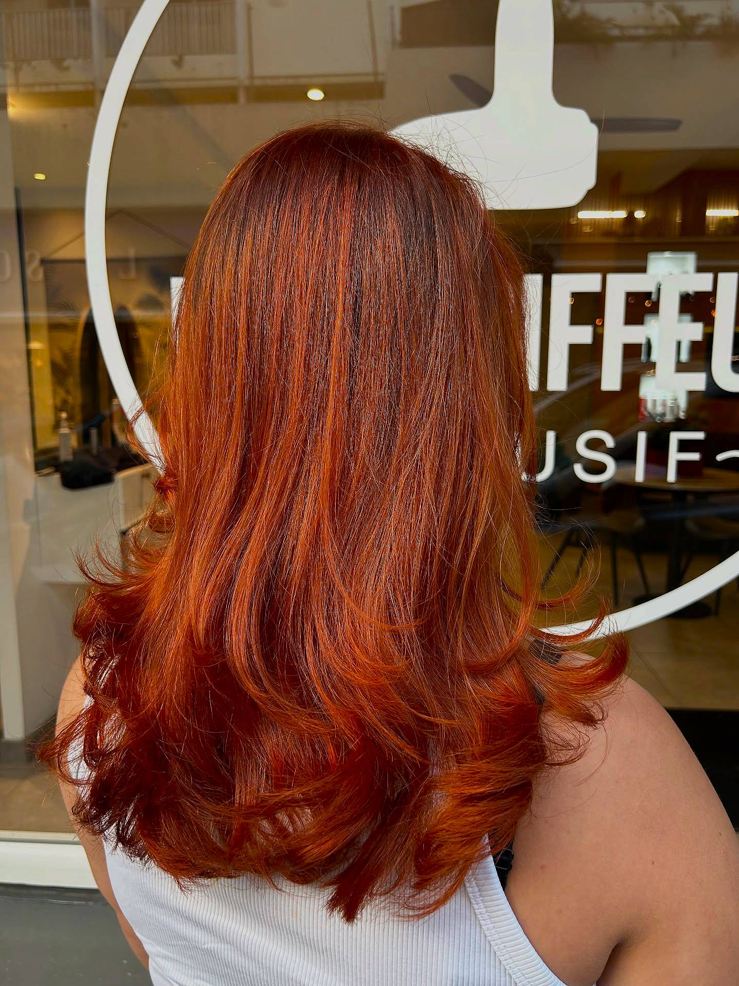 Vibrant Layered Ginger Hair with Soft Waves