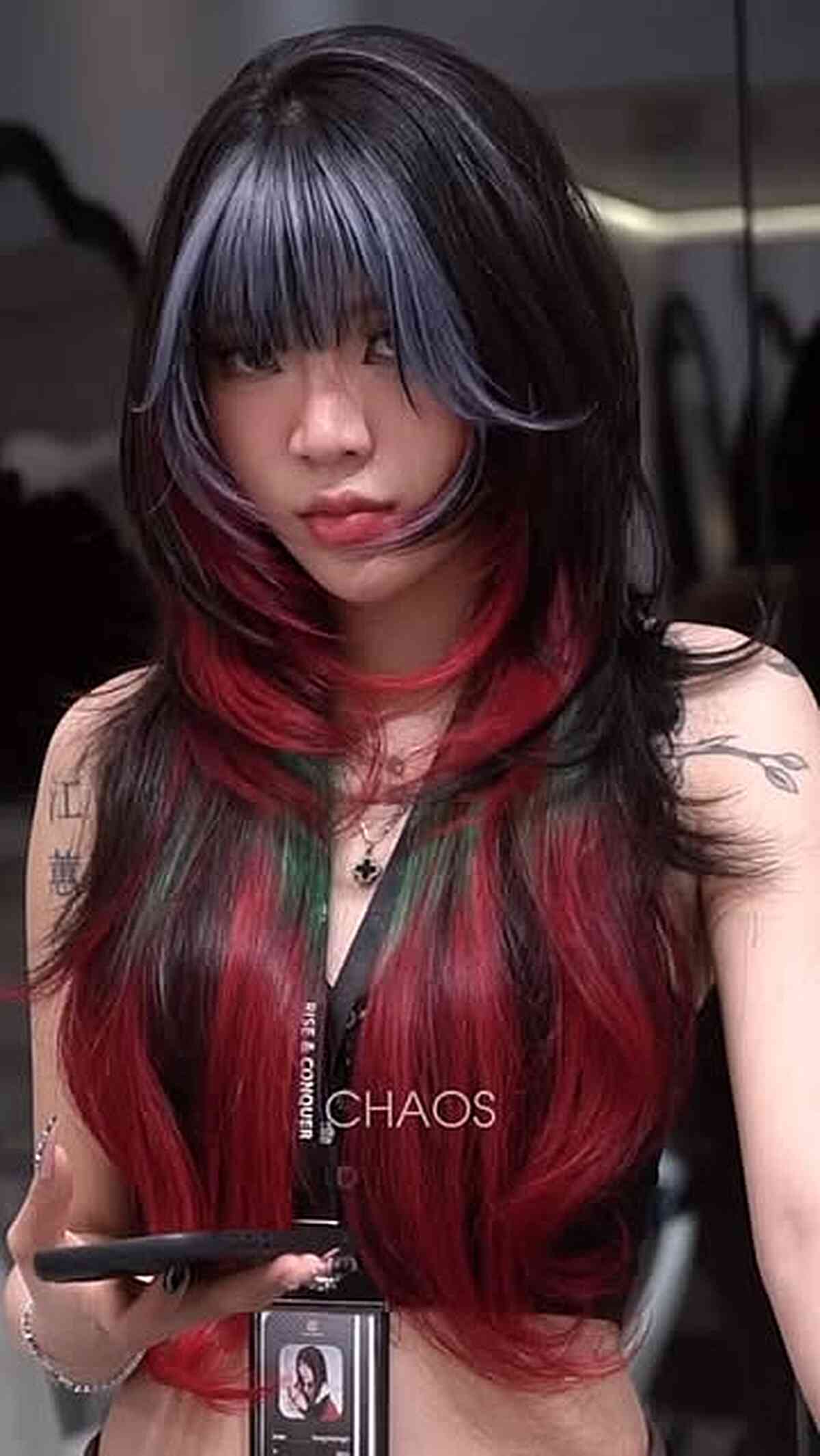 Vibrant Layered Hair with Bold Color Accents