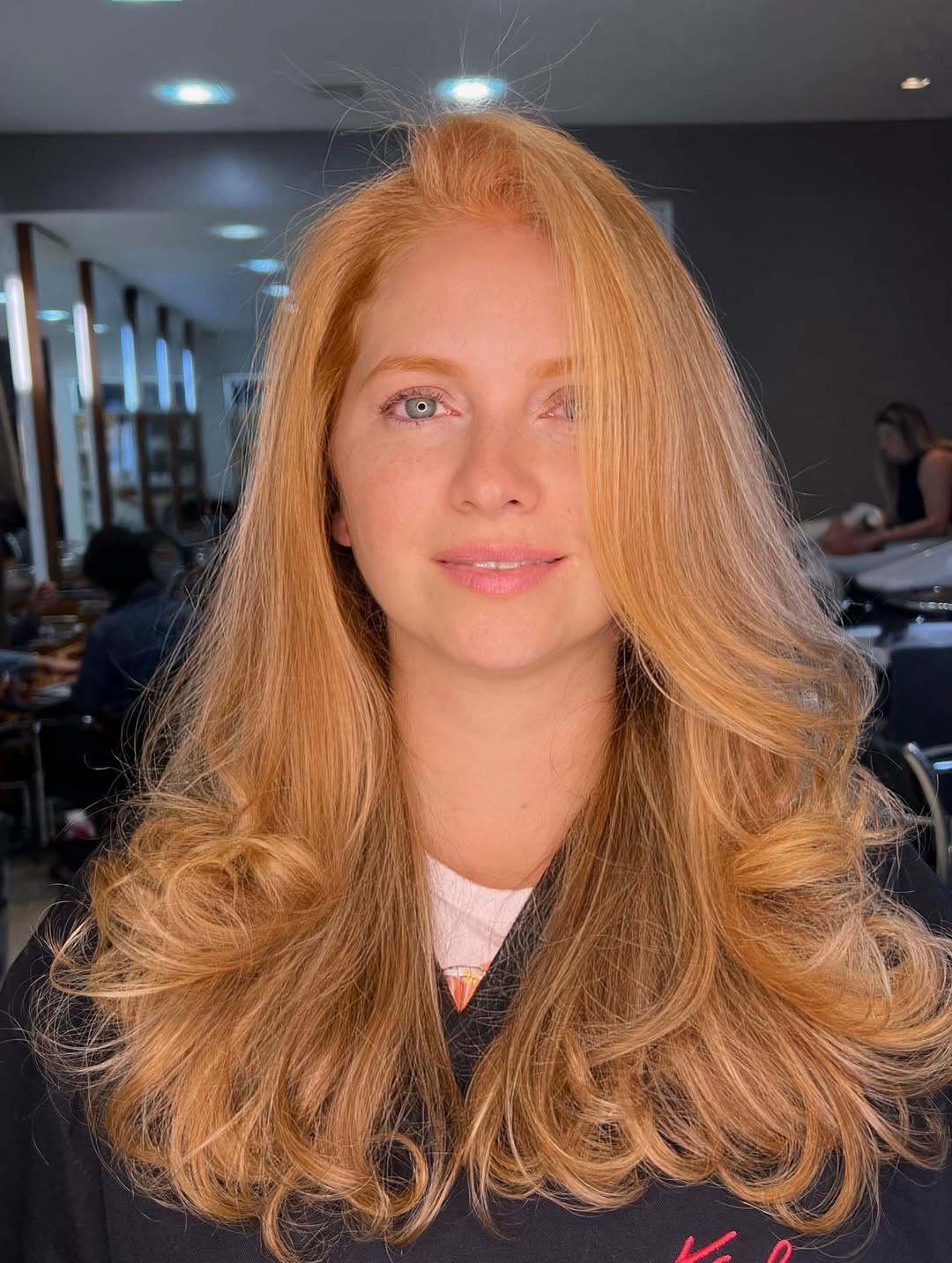 Warm Strawberry Blonde with Soft Waves