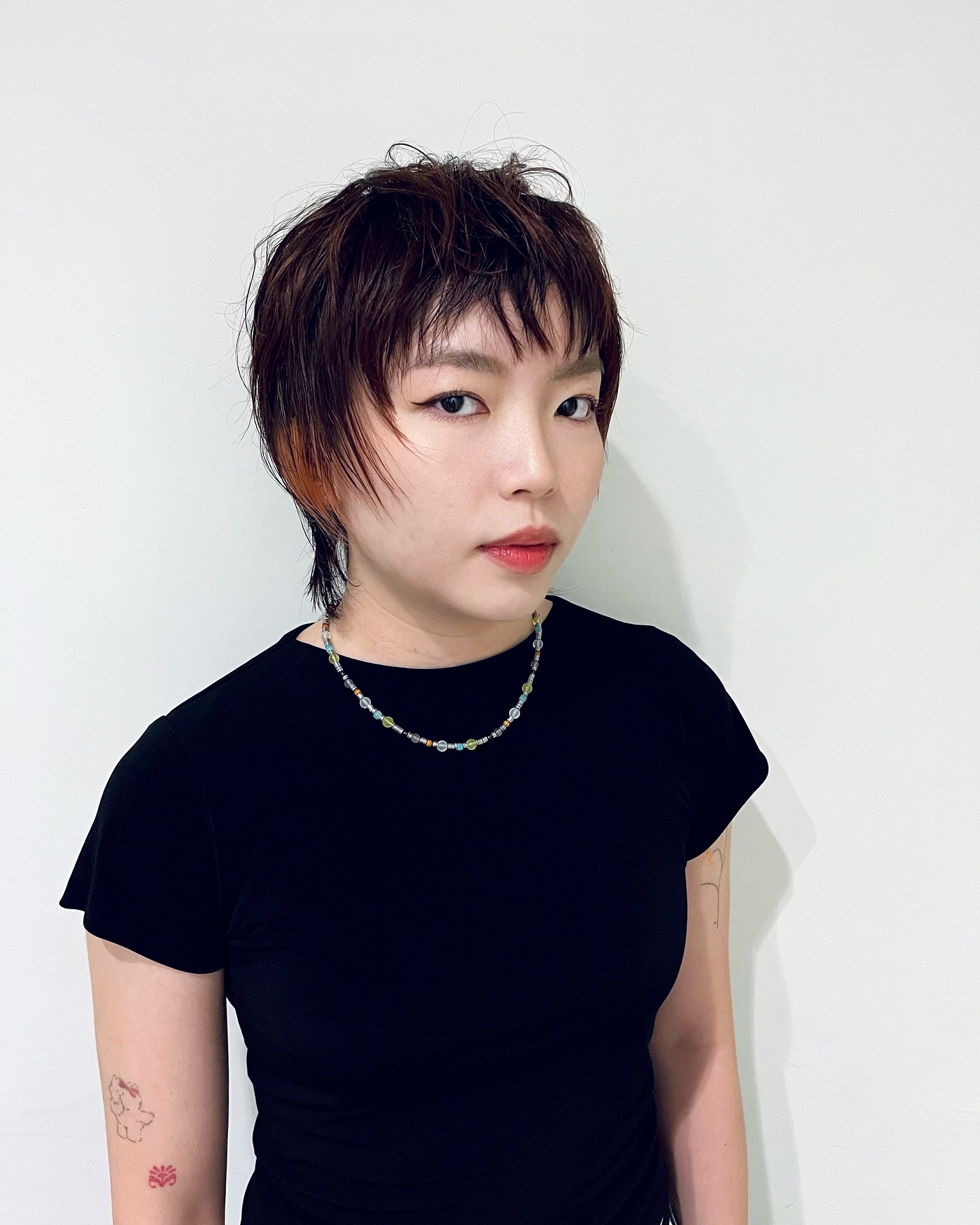 Textured Auburn Pixie with Edgy Undercut