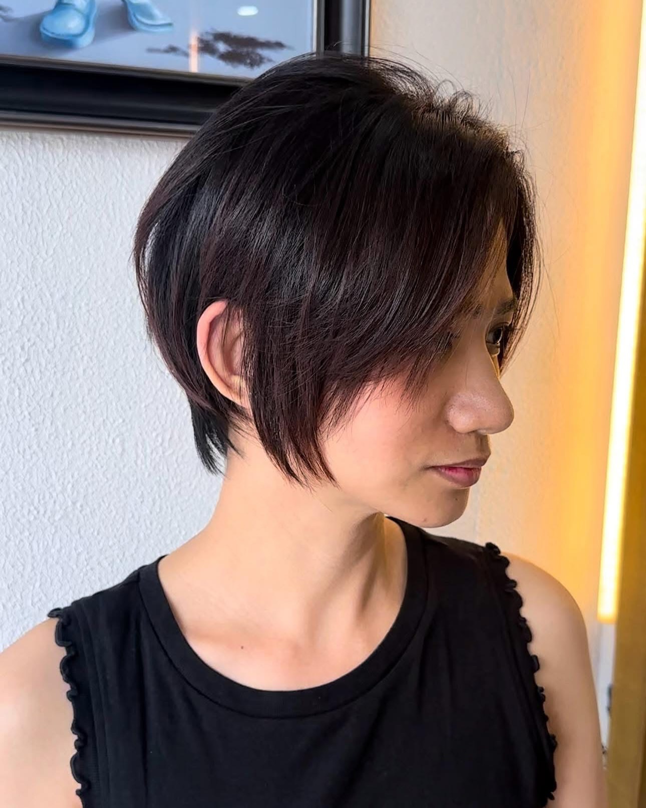 Asymmetric Glossy Brunette Bob with Feathered Ends