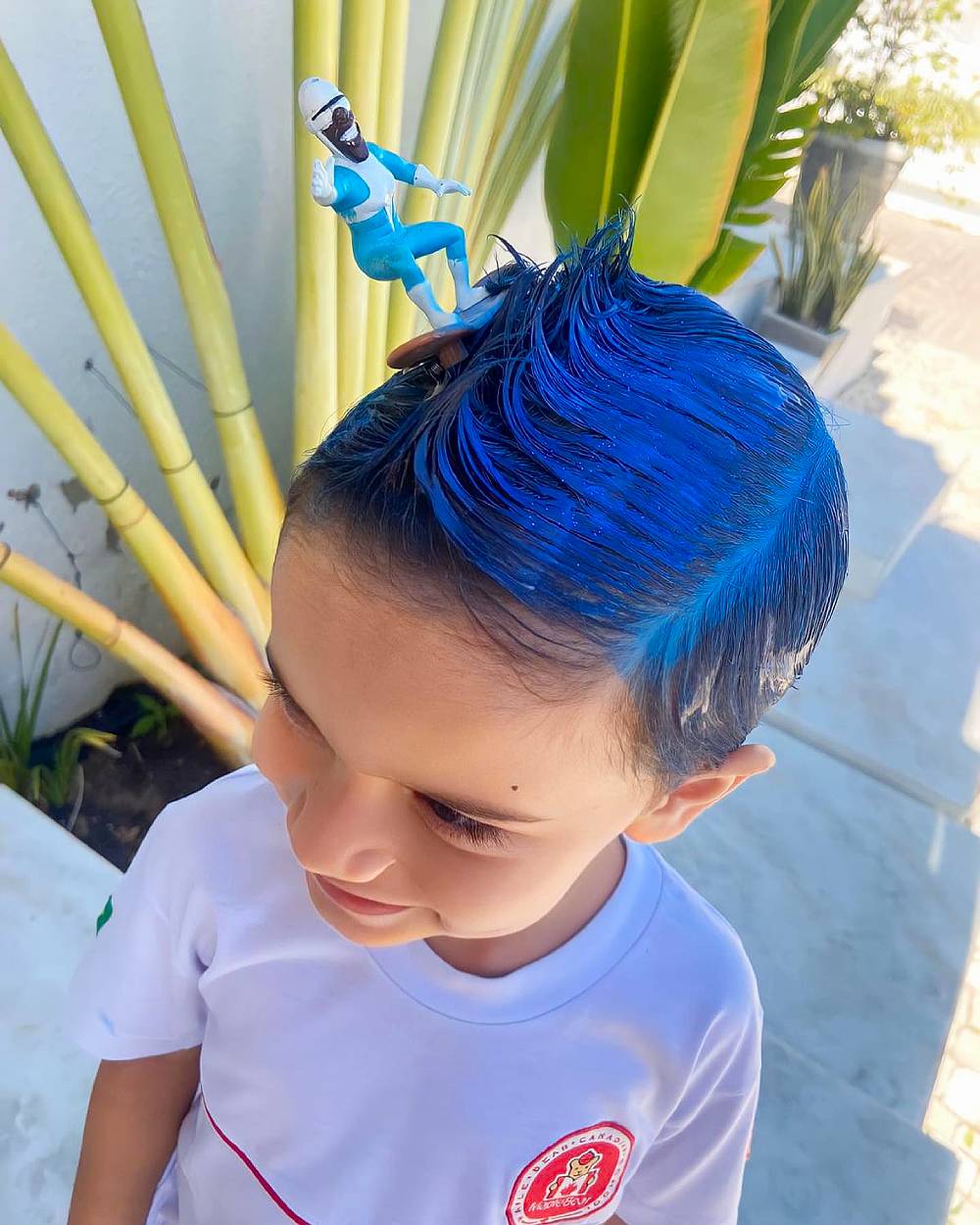 Bold Blue Hairstyle with Playful Accent