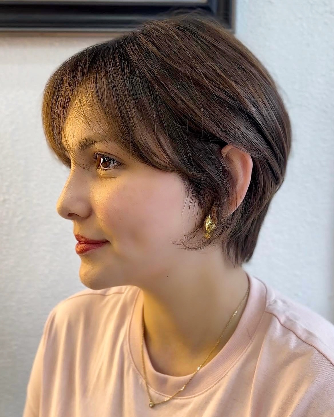 Brunette Textured Side-Swept Bob with Subtle Highlights