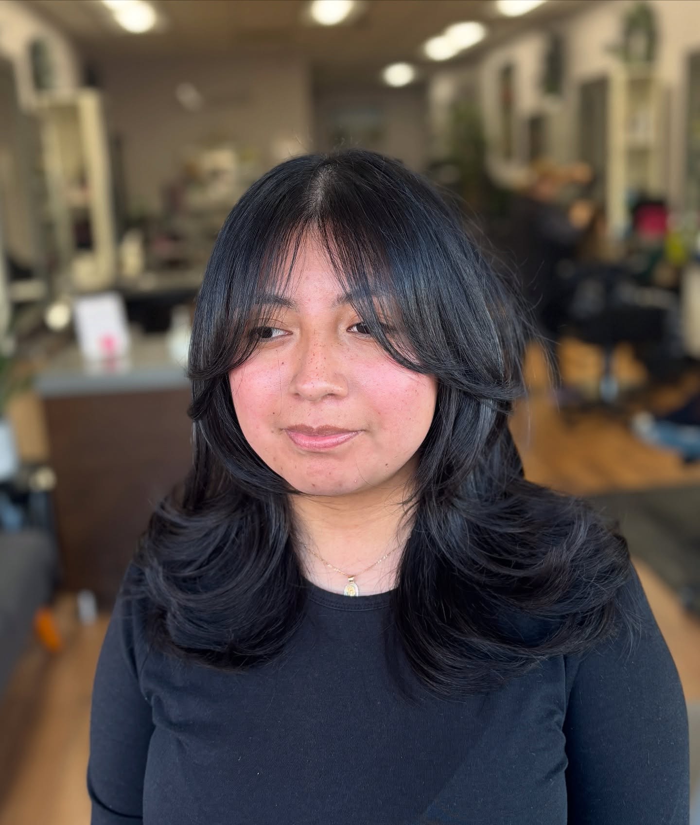 Chic Mid-Length Cut with Soft Face-Framing Layers