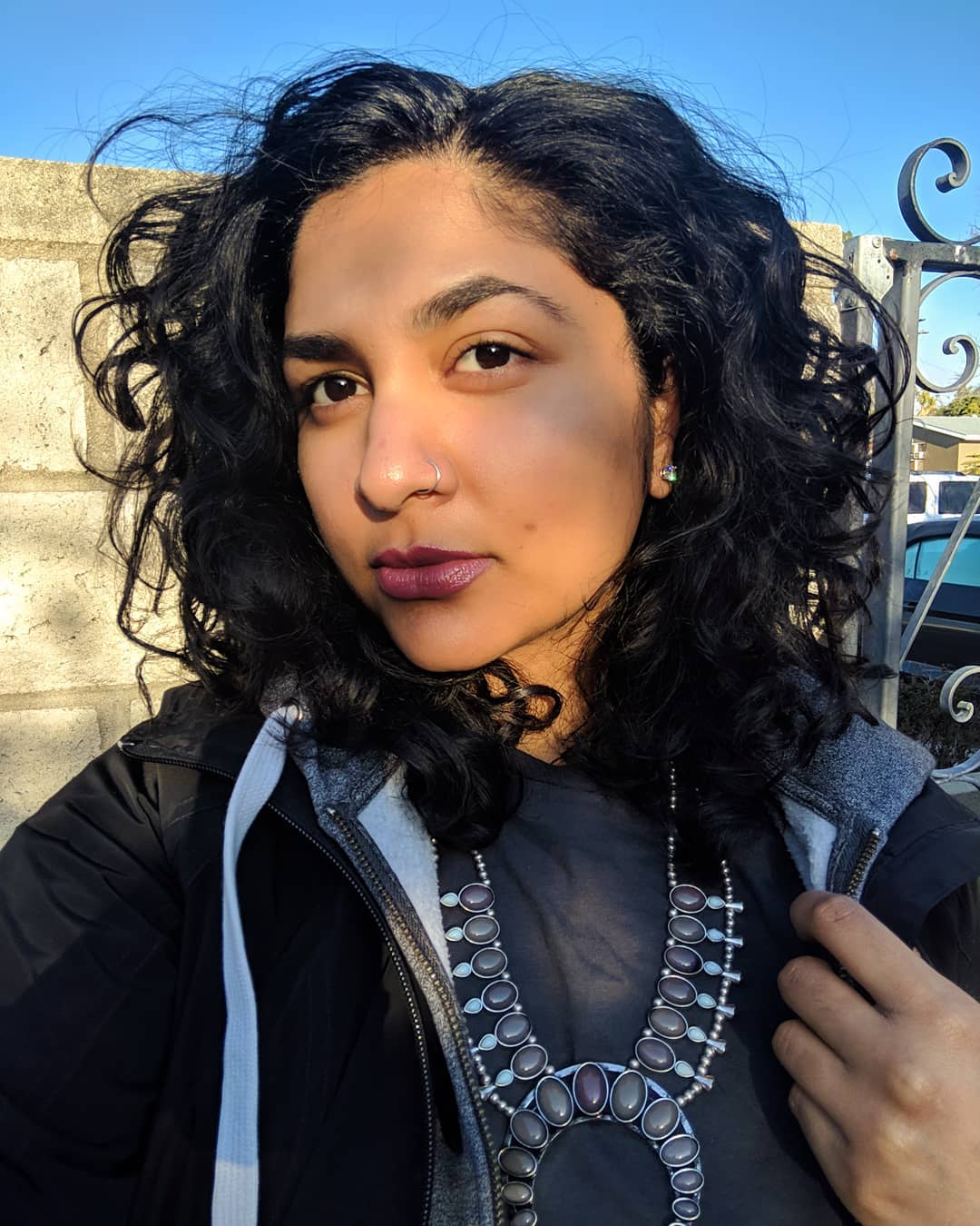 Chic Midnight Curls with Glossy Finish