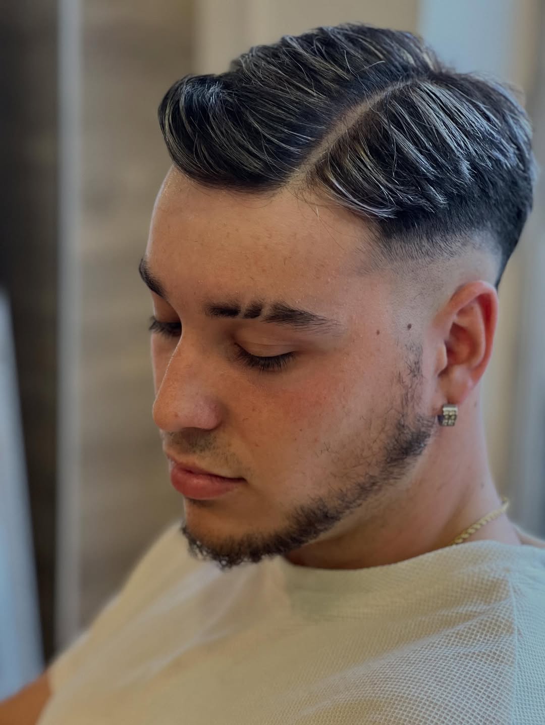 Classic Combed-Over Pompadour with Fade
