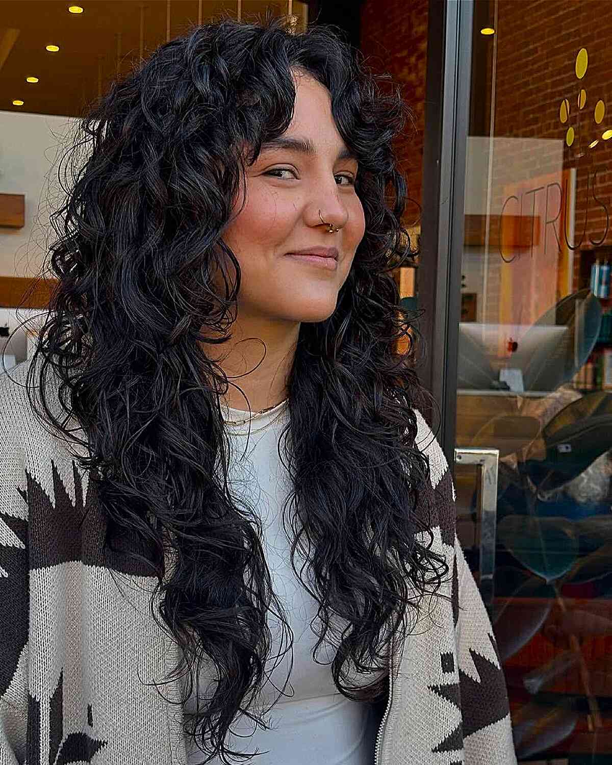 Curly Shag Haircut with Long Layers