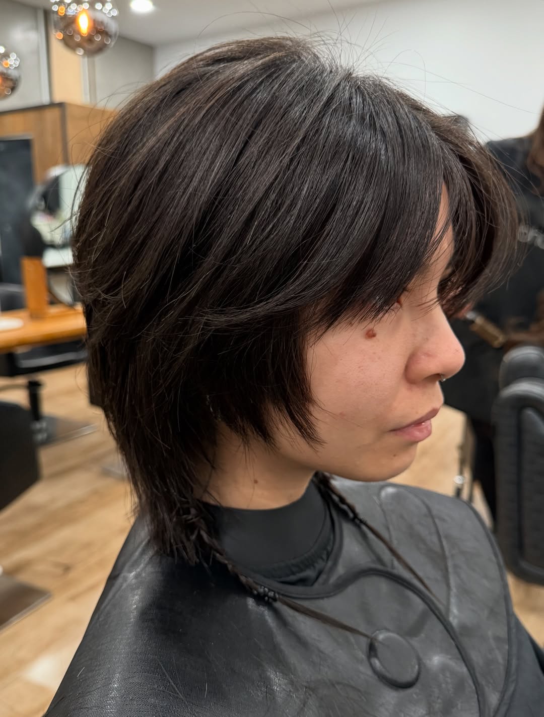 Dramatic Dark A-Line Bob with Sweeping Fringe