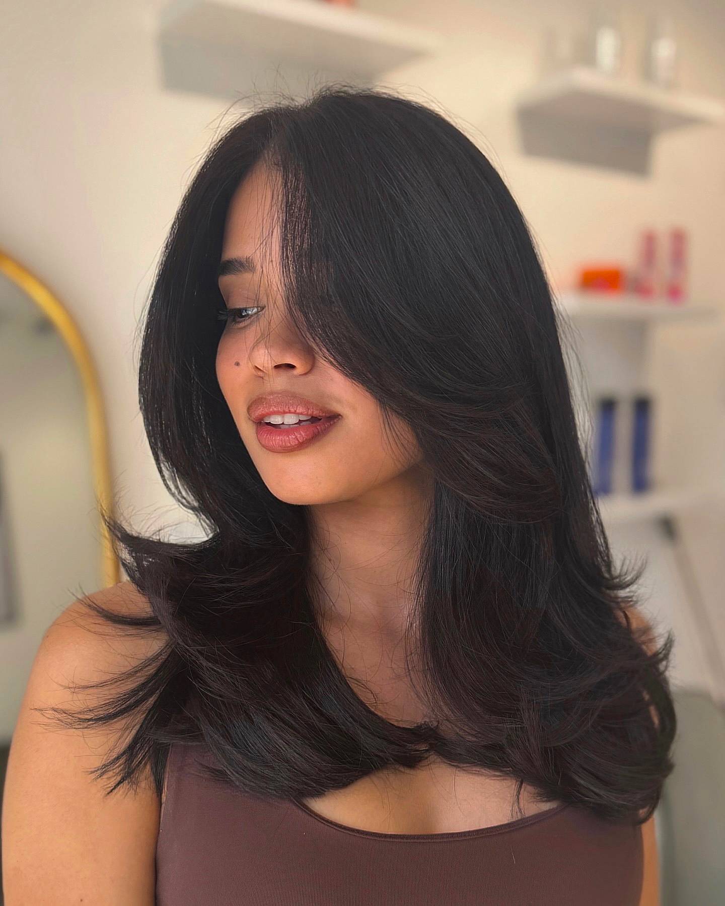 Elegant Layered Mid-Length Cut with Subtle Face-Framing Layers