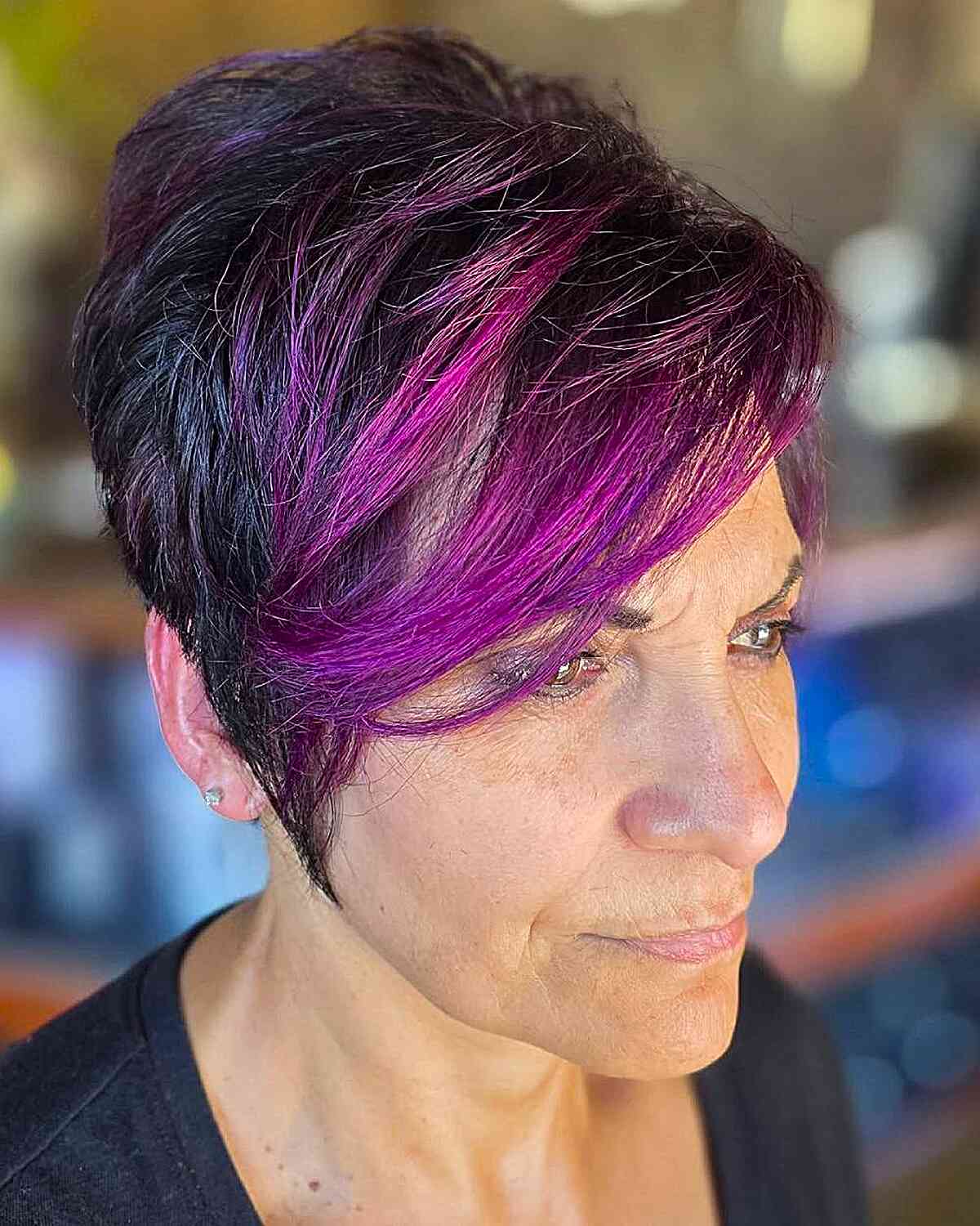 Funky Pixie Cut with Bold Purple Highlights