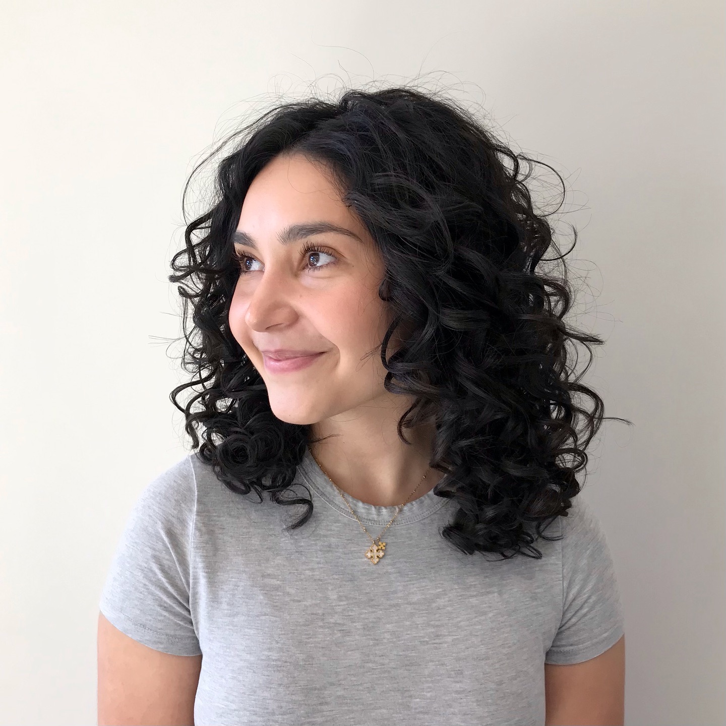 Lustrous Jet-Black Curly Lob with Natural Density