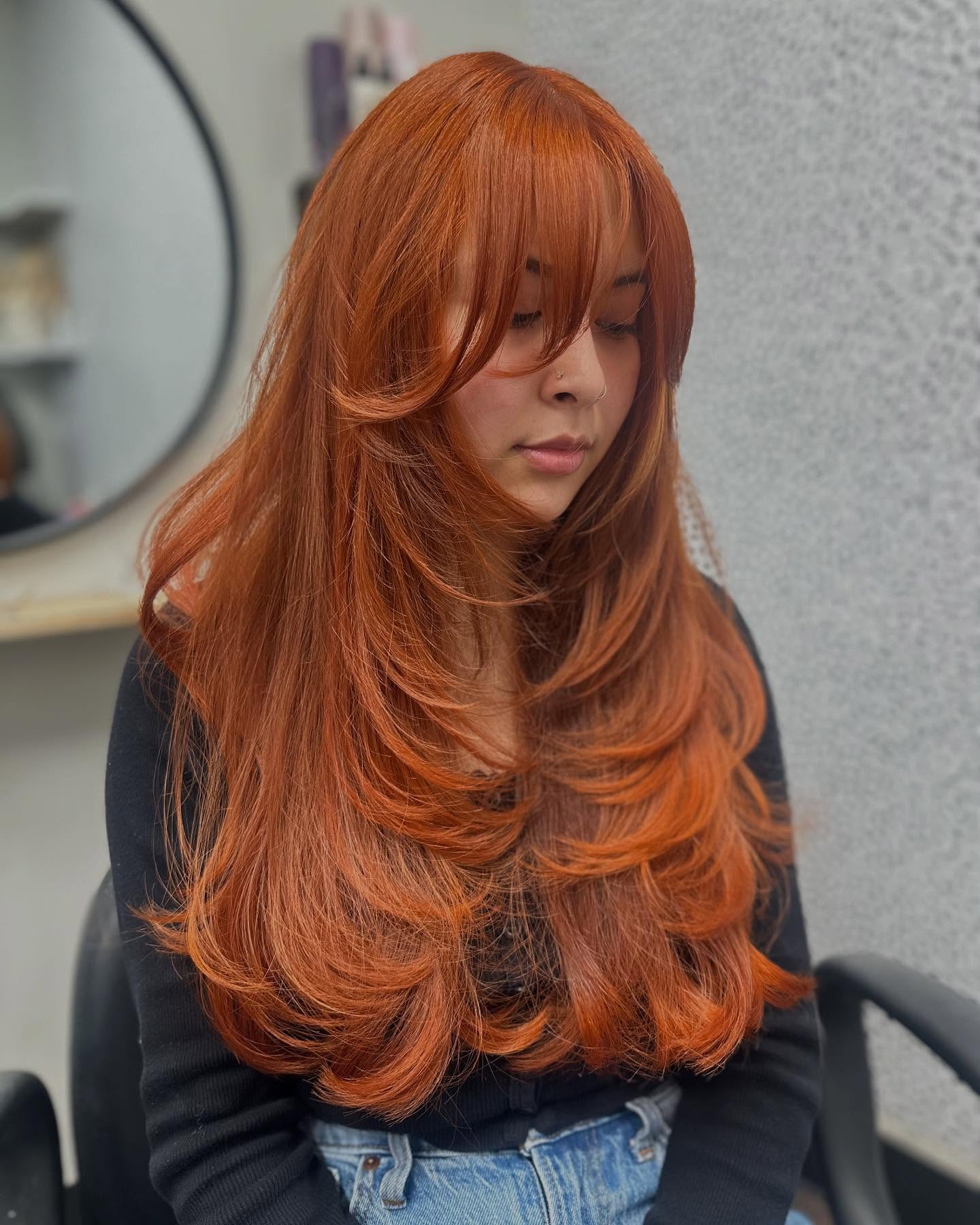 Luxurious Copper Long Layers with Feathered Ends