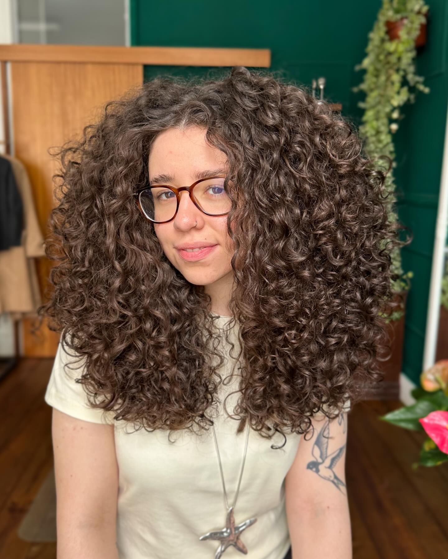 Luxurious Deep Chestnut Spirals with Natural Volume