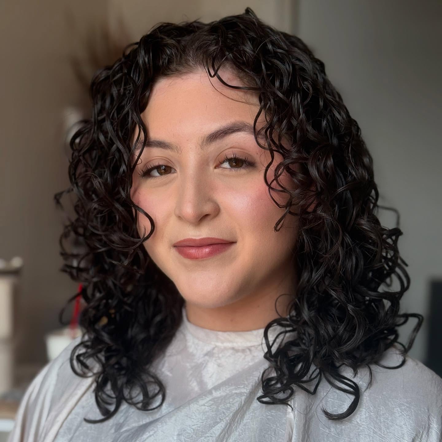 Natural Shimmering Dark Ringlets with Mid-Length Cut