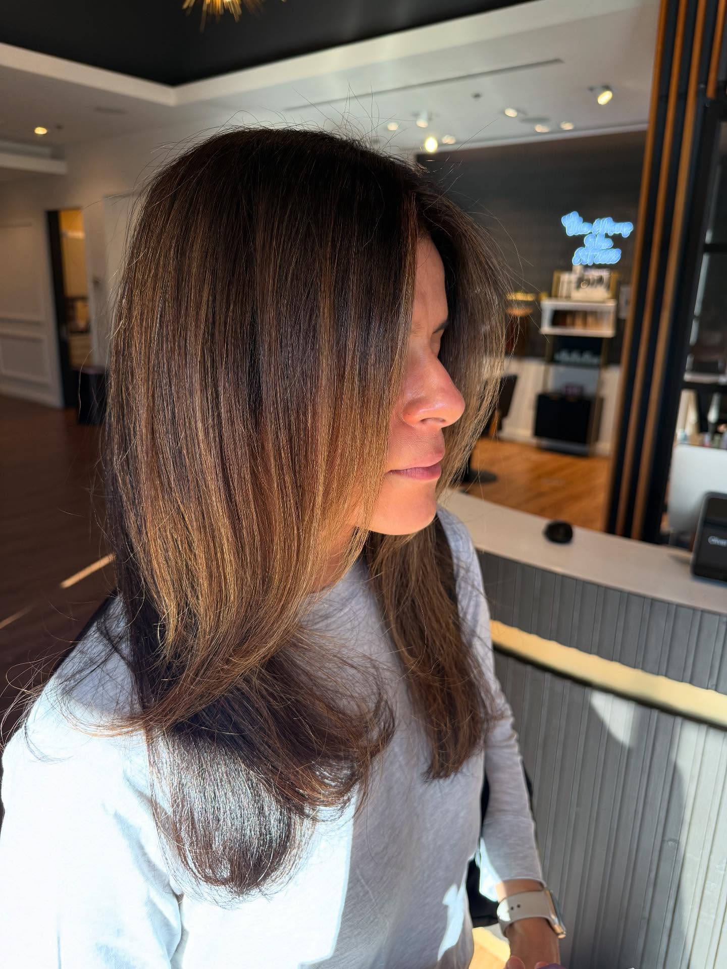 Rich Chestnut Layers with Soft Curtain Bangs