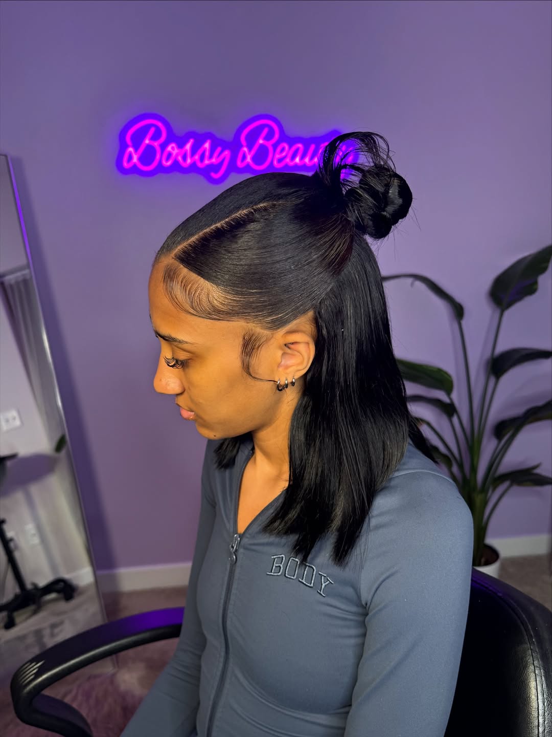 Sleek High Ponytail with Tendril Details