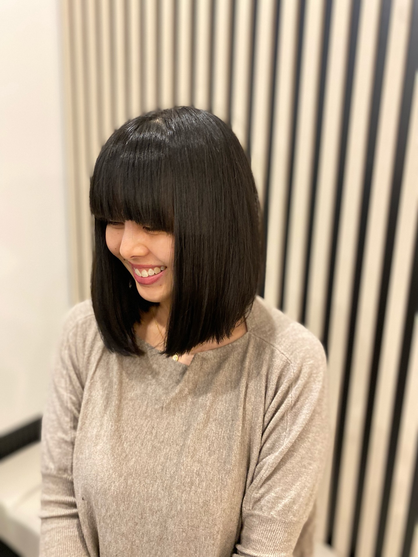Sleek Jet-Black Bob with Full Bangs