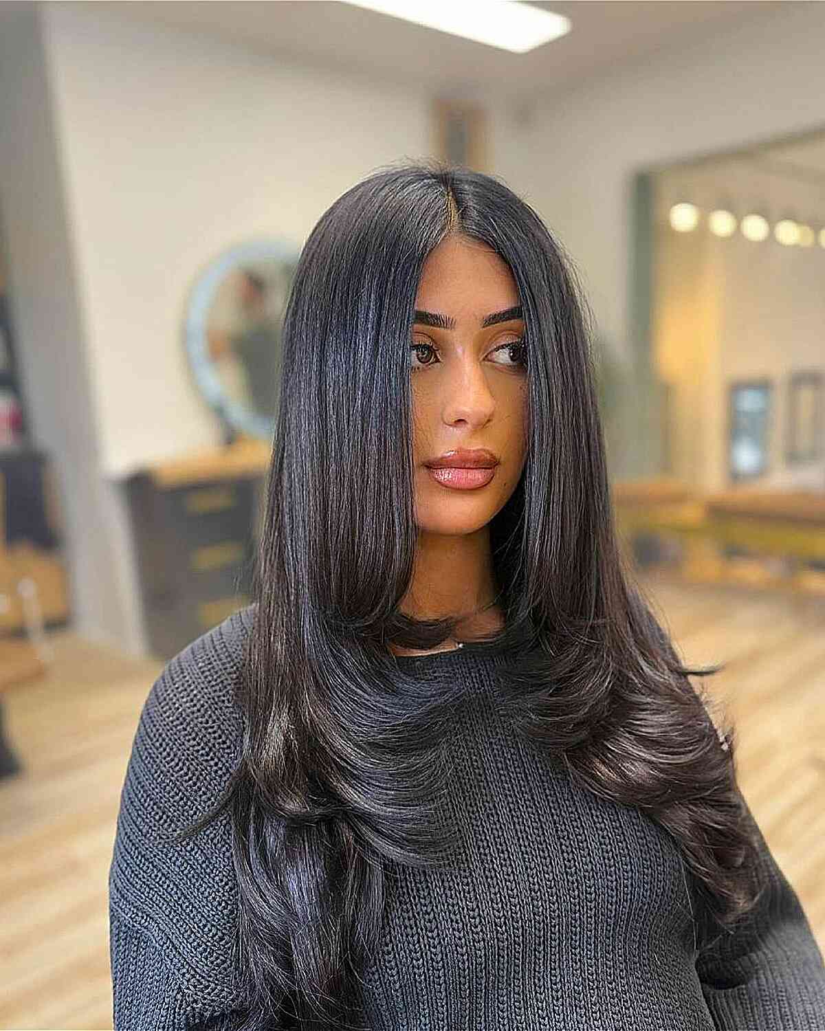 Sleek Long Haircut with Soft Face-Framing Layers