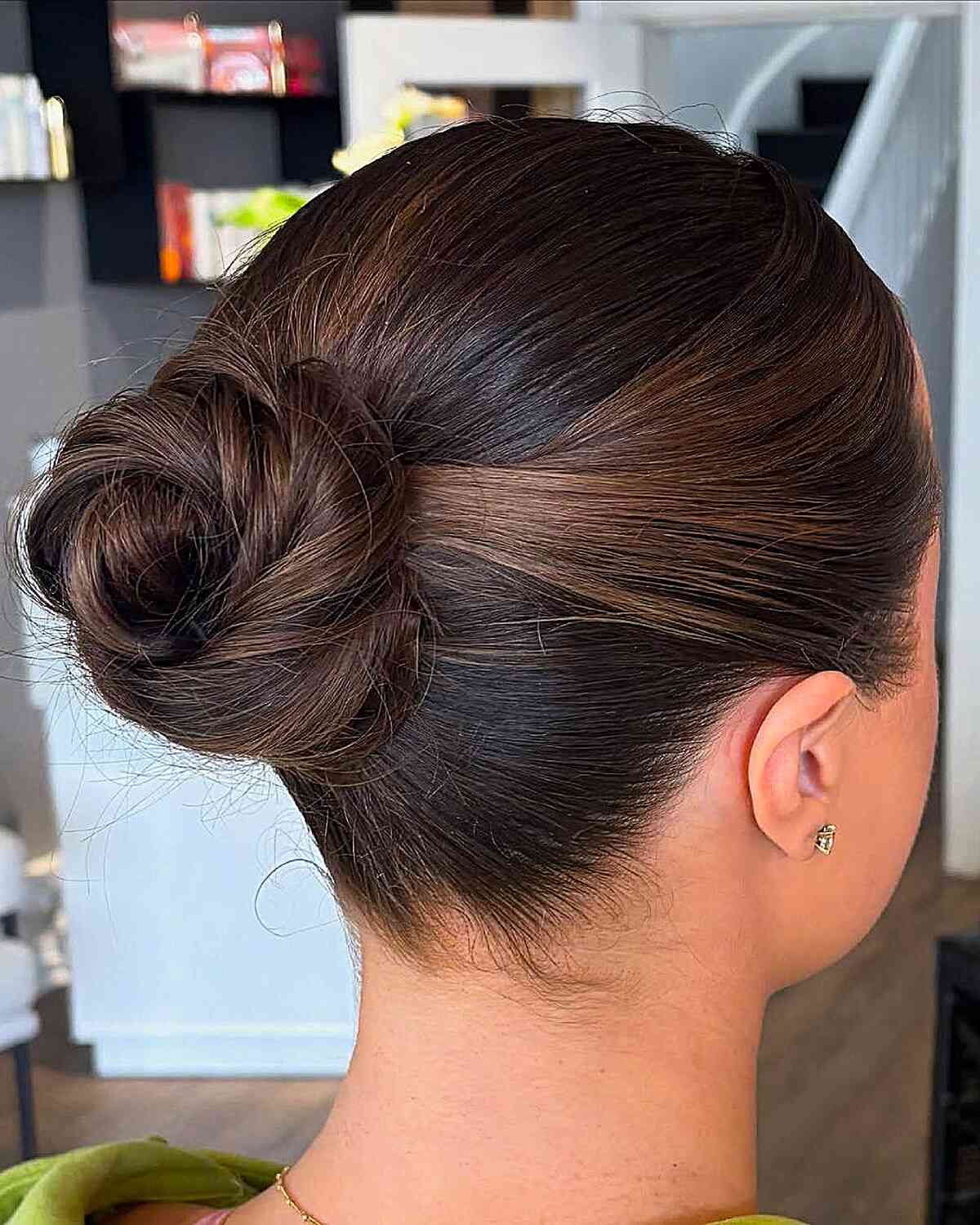 Sleek Low Chignon with Subtle Dimension