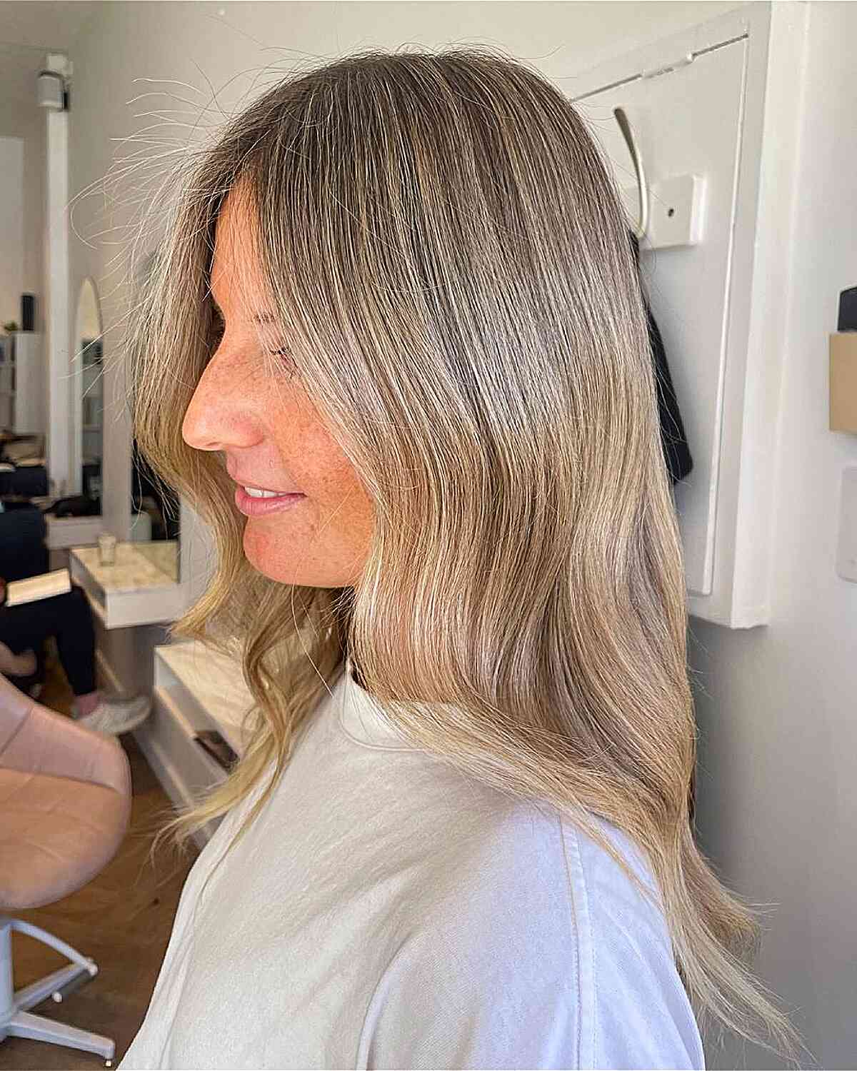 Soft Beige Blonde Waves with Face-Framing Layers