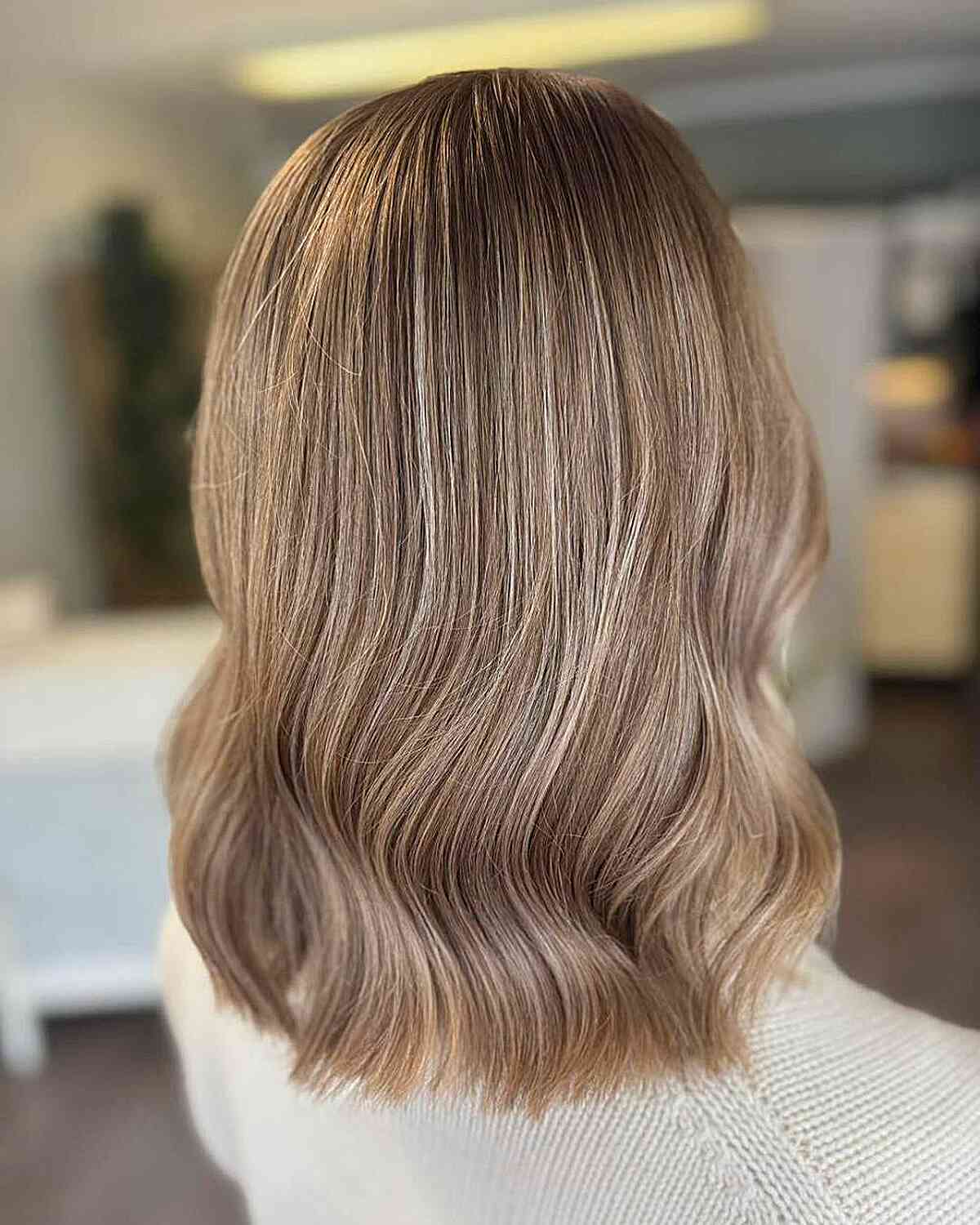 Soft Wavy Lob with Dark Blonde Highlights