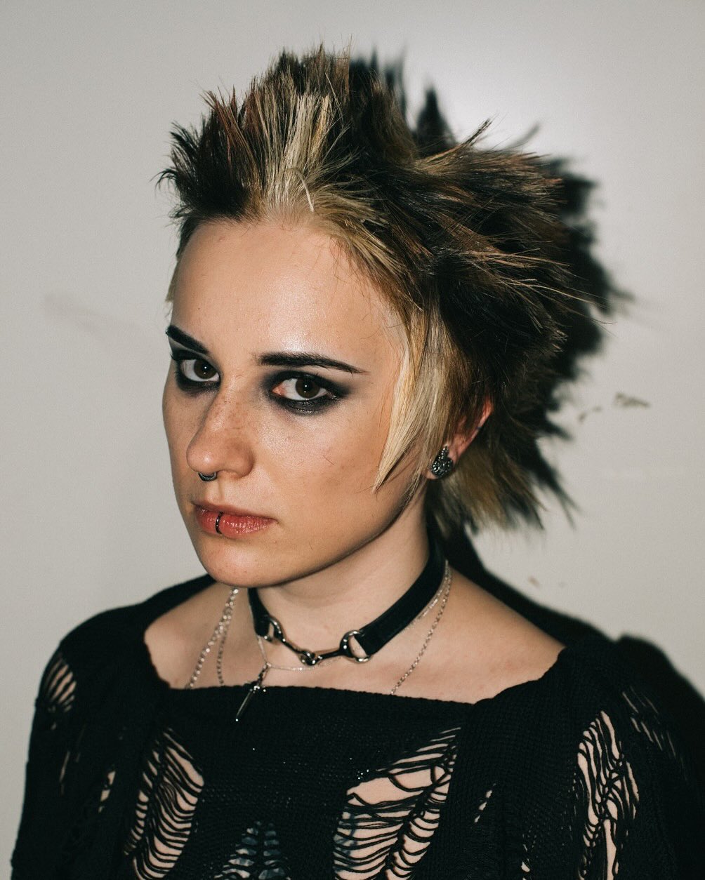 Spiky Blonde Punk Mullet with Dark Roots