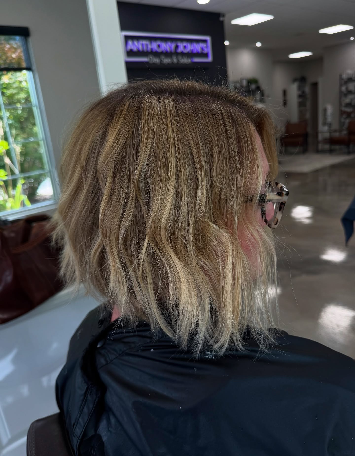 Textured Wavy Inverted Bob with Sun-Kissed Highlights