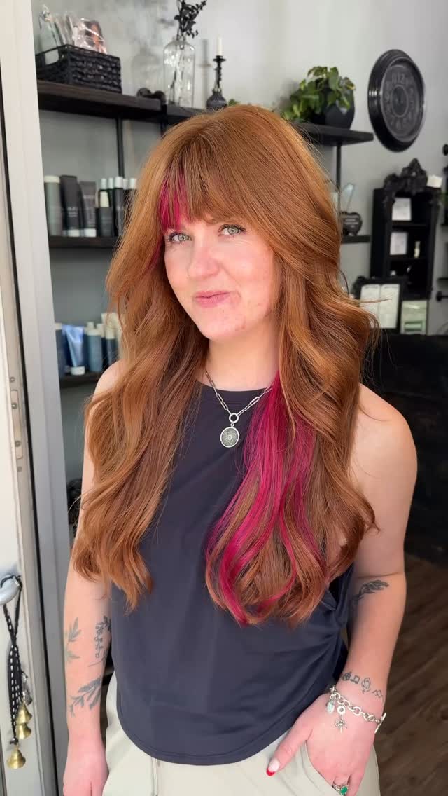 Vibrant Auburn Cascade with Bold Pink Highlights