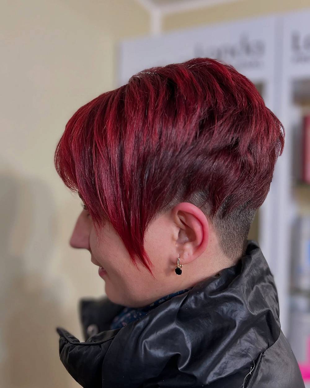 Bold Asymmetrical Short Cut with Deep Red Undertones
