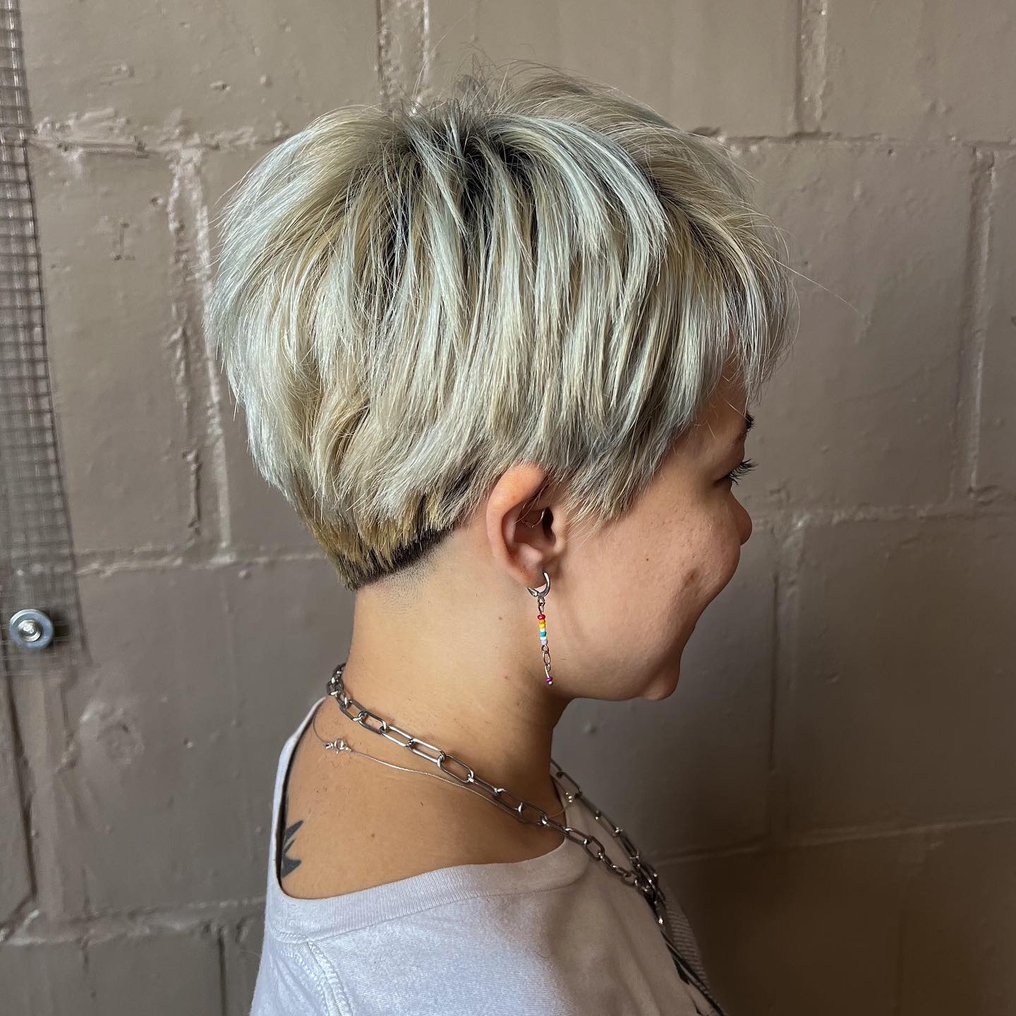 Chic Textured Short Cut with Bold Platinum Highlights