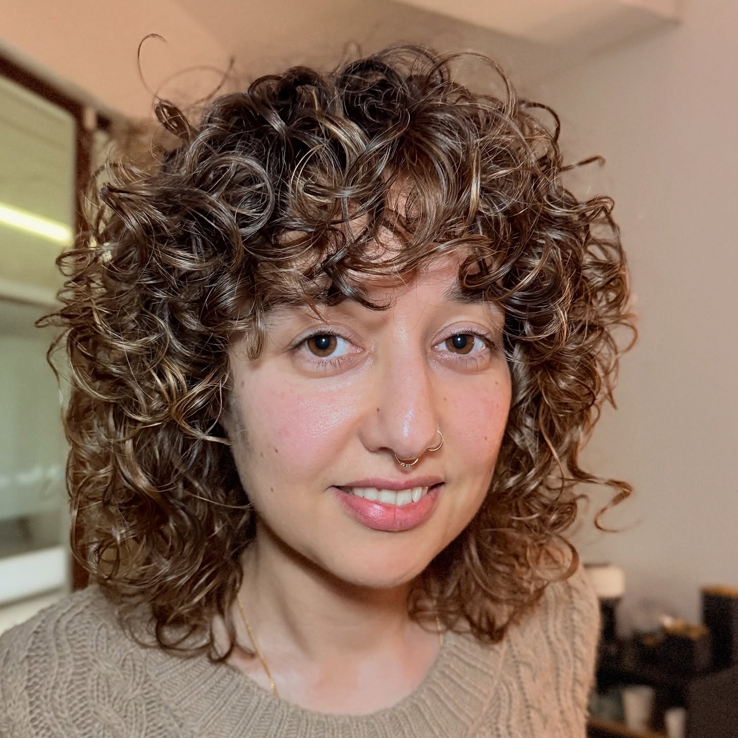 Curly Caramel Cascade with Voluminous Texture